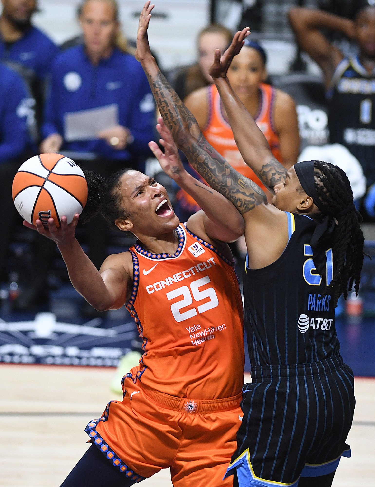  Connecticut Sun’s Alyssa Thomas (25) puts up a basket against Chicago Sky’s Robyn Parks (21) during a WNBA basketball game at Mohegan Sun Arena Sunday, June 25, 2023. (Sarah Gordon/The Day) 