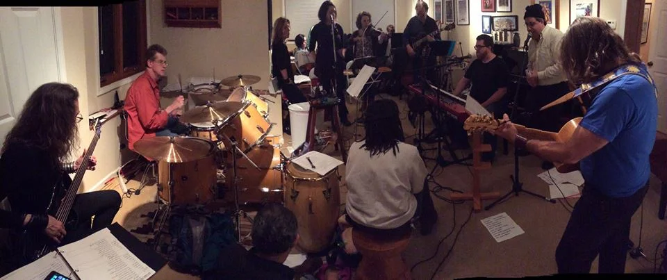  Behind the scenes getting ready for the show. All fifteen of us squeezed into drummer Peter Manis' rehearsal space! 