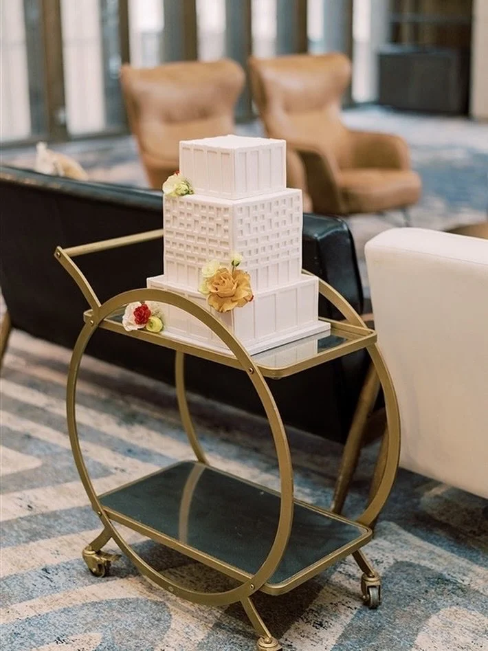 Displaying your wedding cake on a bar cart? I mean why the hell not?!