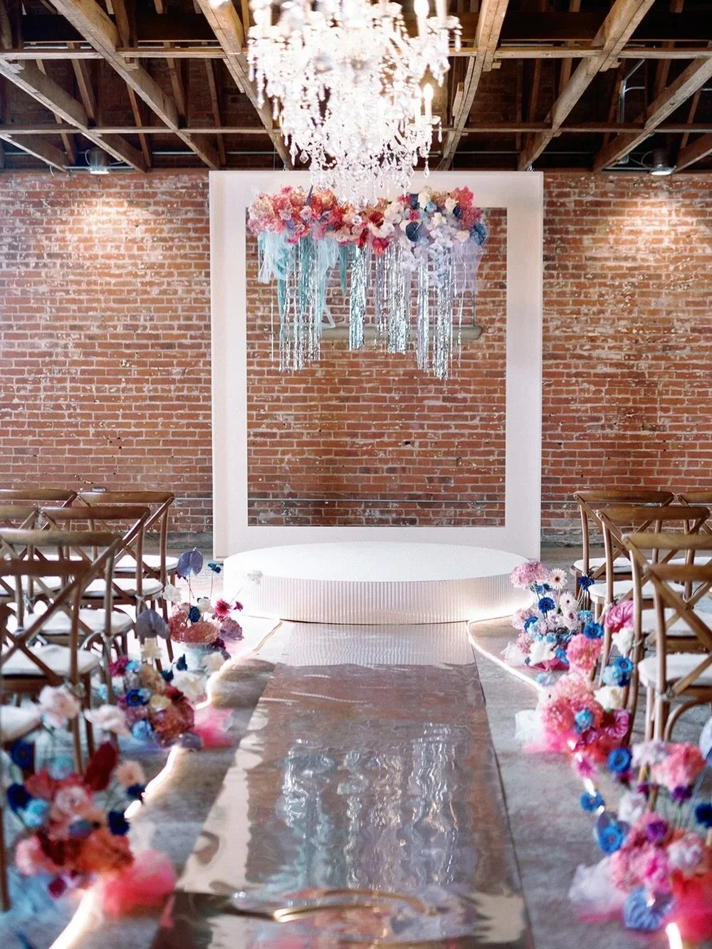 How was this possible three years ago?!? This is still one of the coolest and most unique weddings I&rsquo;ve ever had the pleasure of doing. Fur, tons of neon, festival bracelets to guide guests to their seats, a mirrored aisle and two kids sooo in 