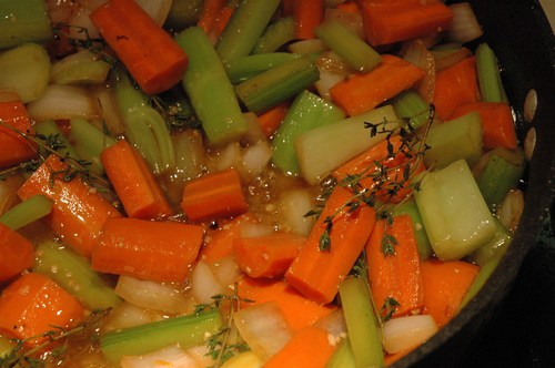 Shortribs on a set of mirepoix with clarified butter. 