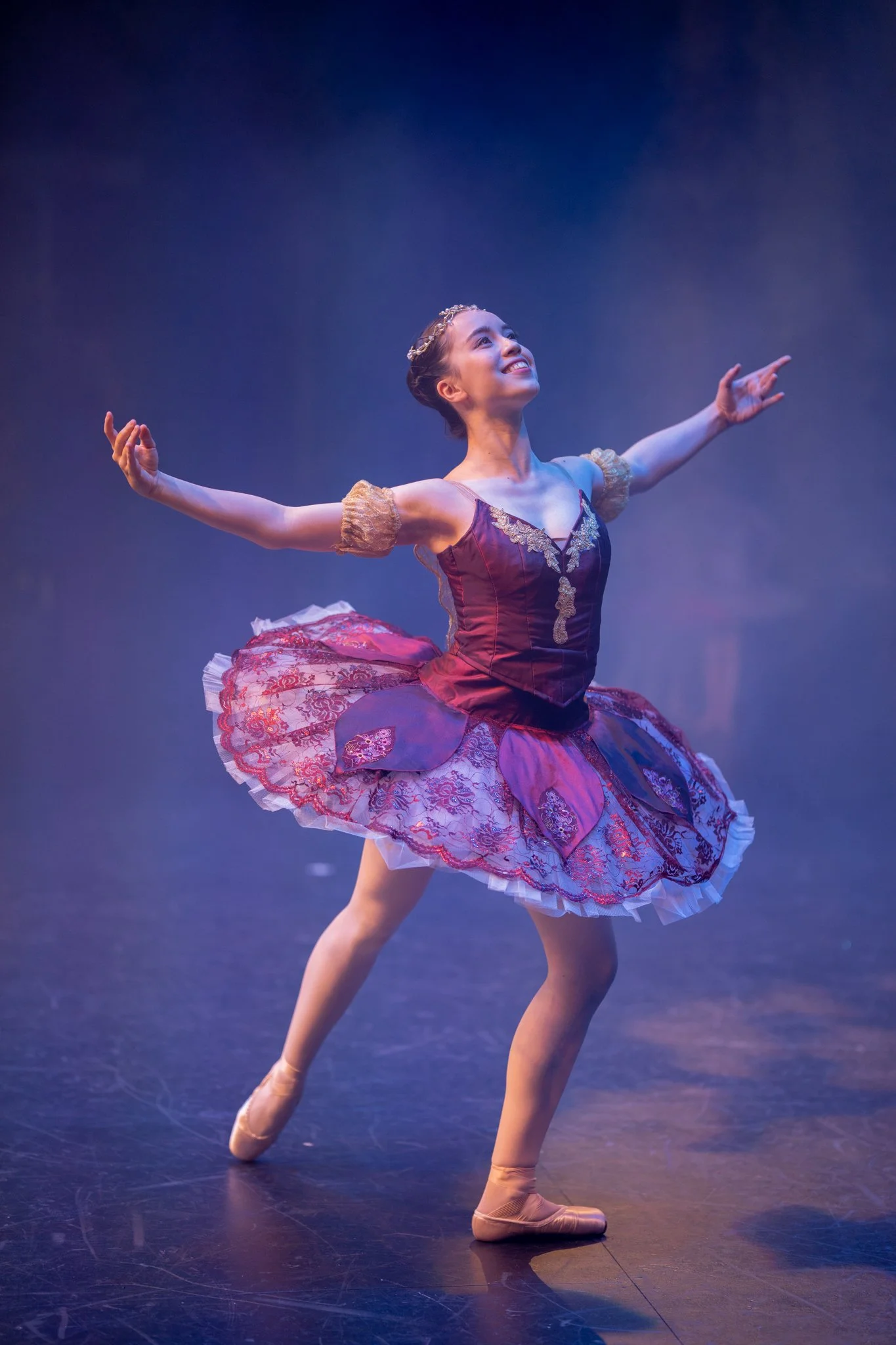Dancer performing on stage at Turning Pointe Dance Academy