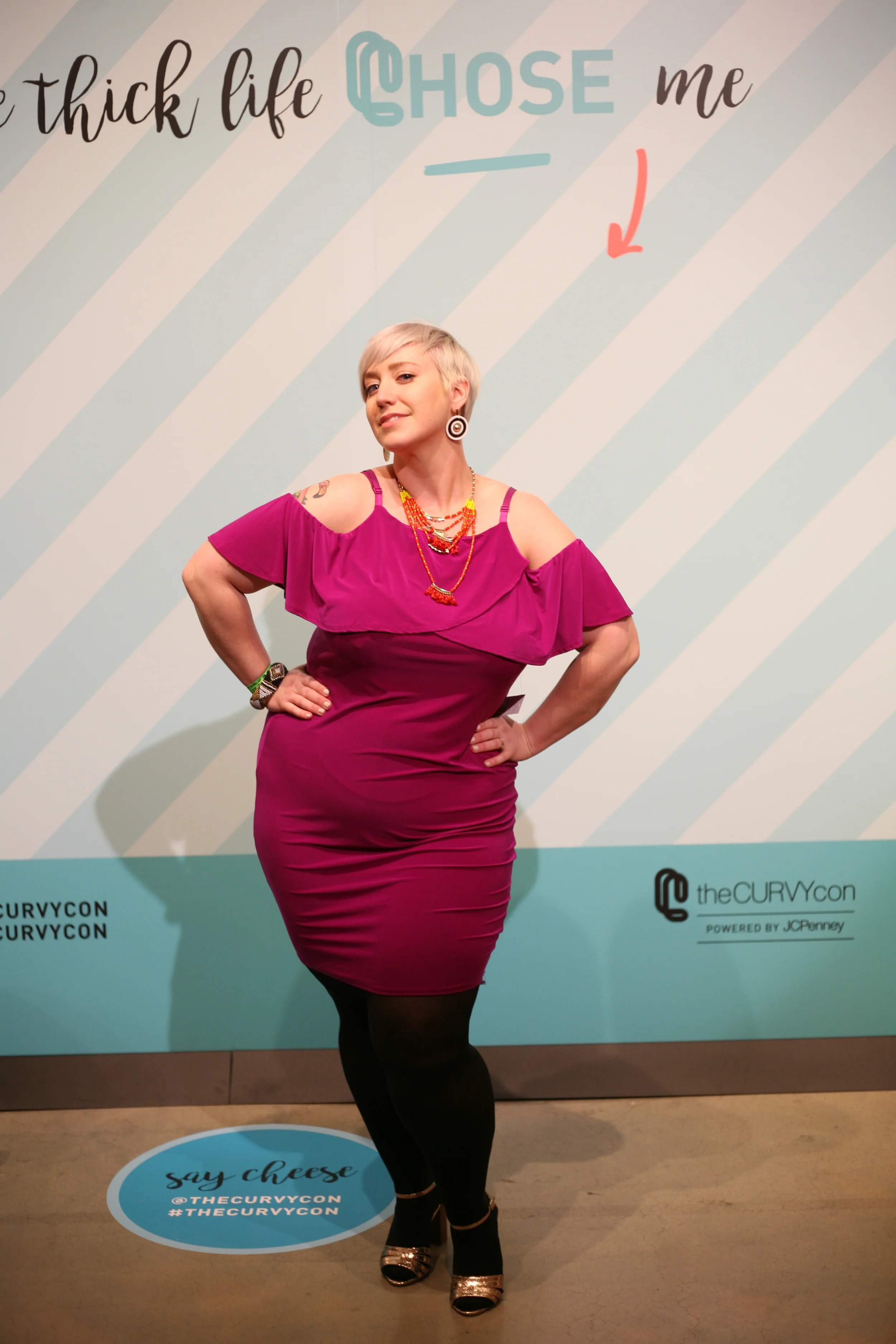 Fluorescent lighting is not my photo forté and no, I wouldn't normally wear black tights, but this FTF Evanne Cold Shoulder Ruffle Dress makes up for it! $46.90 and available in 0X - 3X. I took this one home with me :).