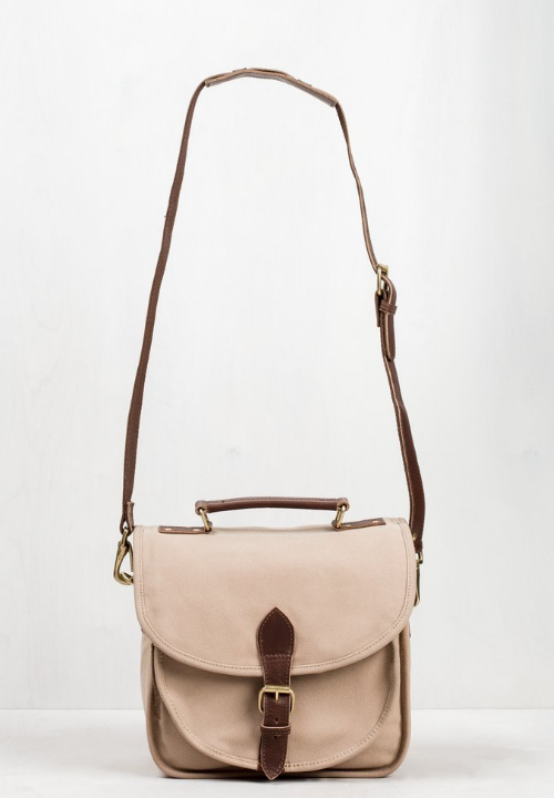 UNITED BY BLUE: JUNIPER CAMERA CROSSBODY - $148; B Corp certified , made with organic cotton and vegetable-tanned leather. UBB removes one pound of trash from our oceans for every product sold.