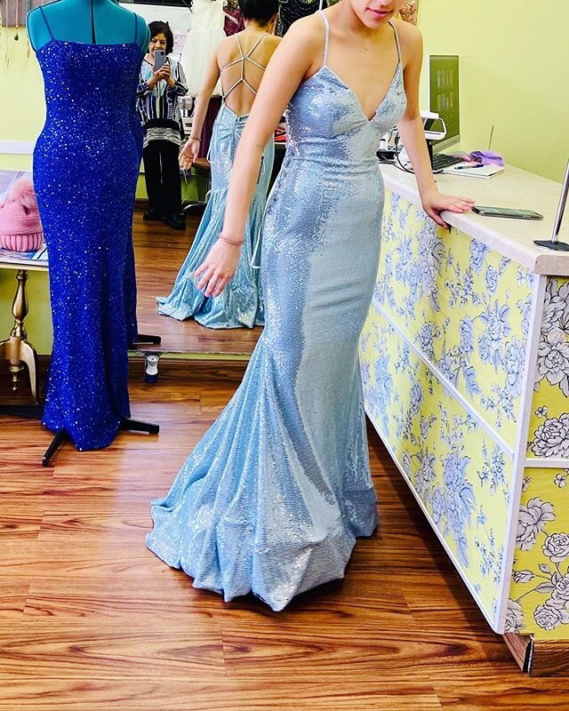 Kicking off prom season with a sequined mermaid gown and a cascading tulle train.