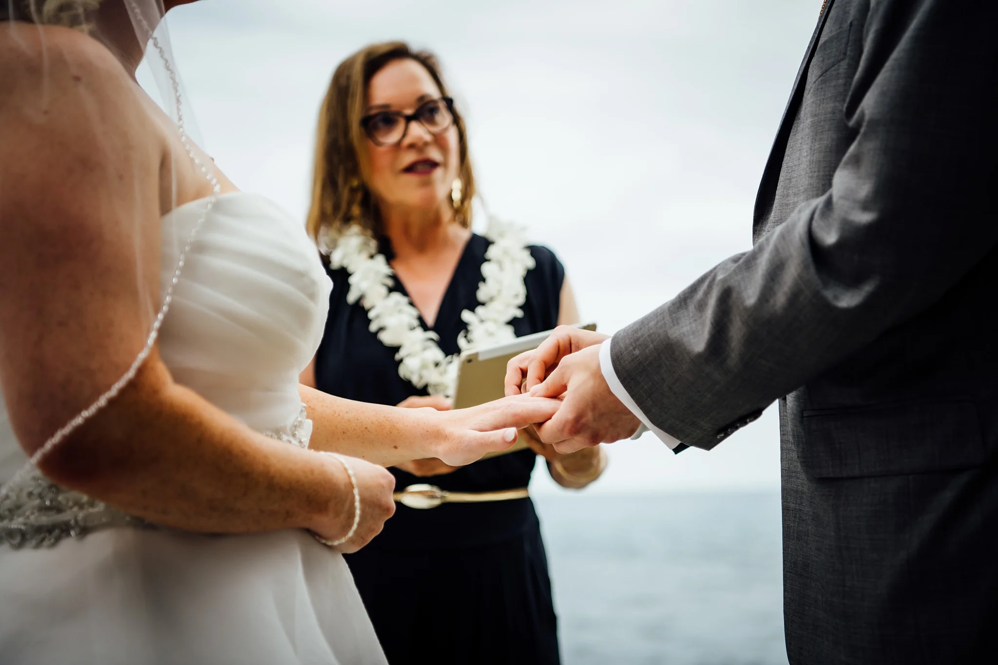 Wedding ring exchange during kona wedding