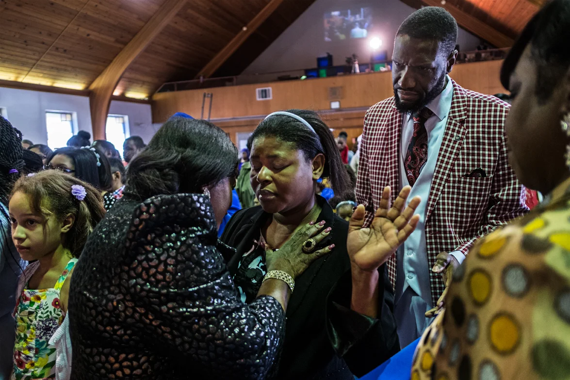 At the end of the service, by choice, followers come up in the front to receive what they call “the holy spirit“. 