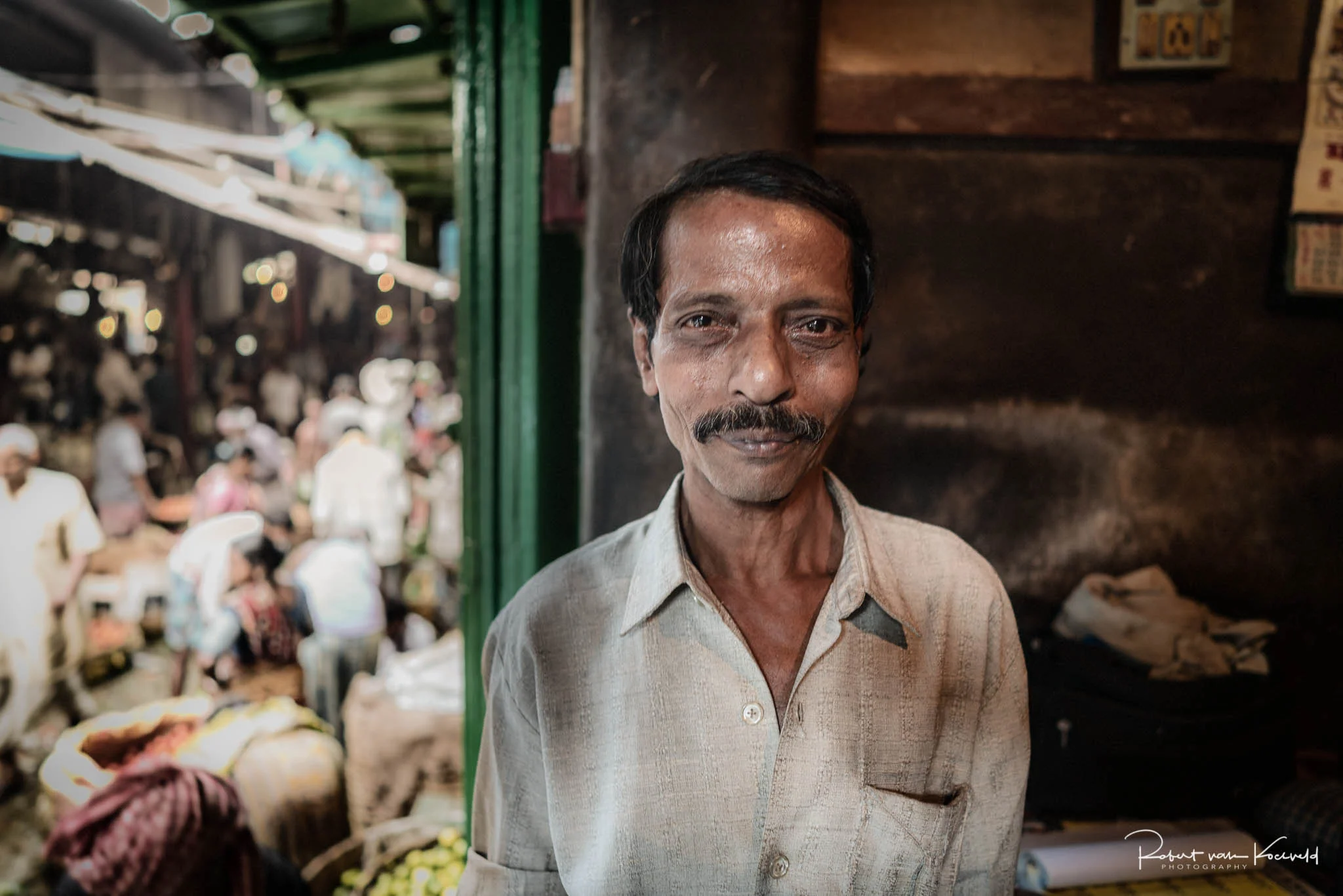Talik Rai has been working at the markets for more than 15 years. He operates one of the scales used to weigh produce as it is bought and sold.