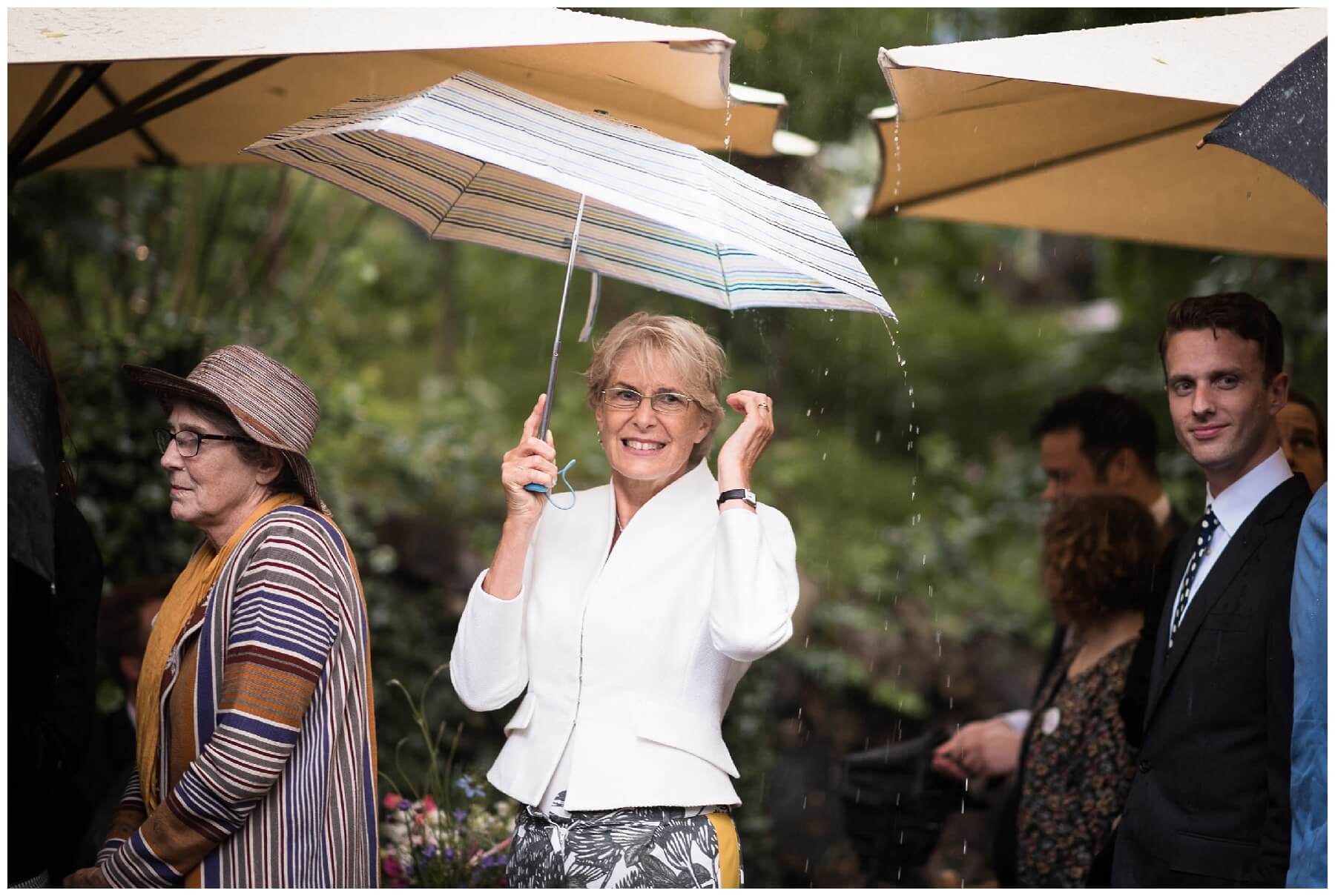 london-wedding-photographer-raining-umbrella.jpg