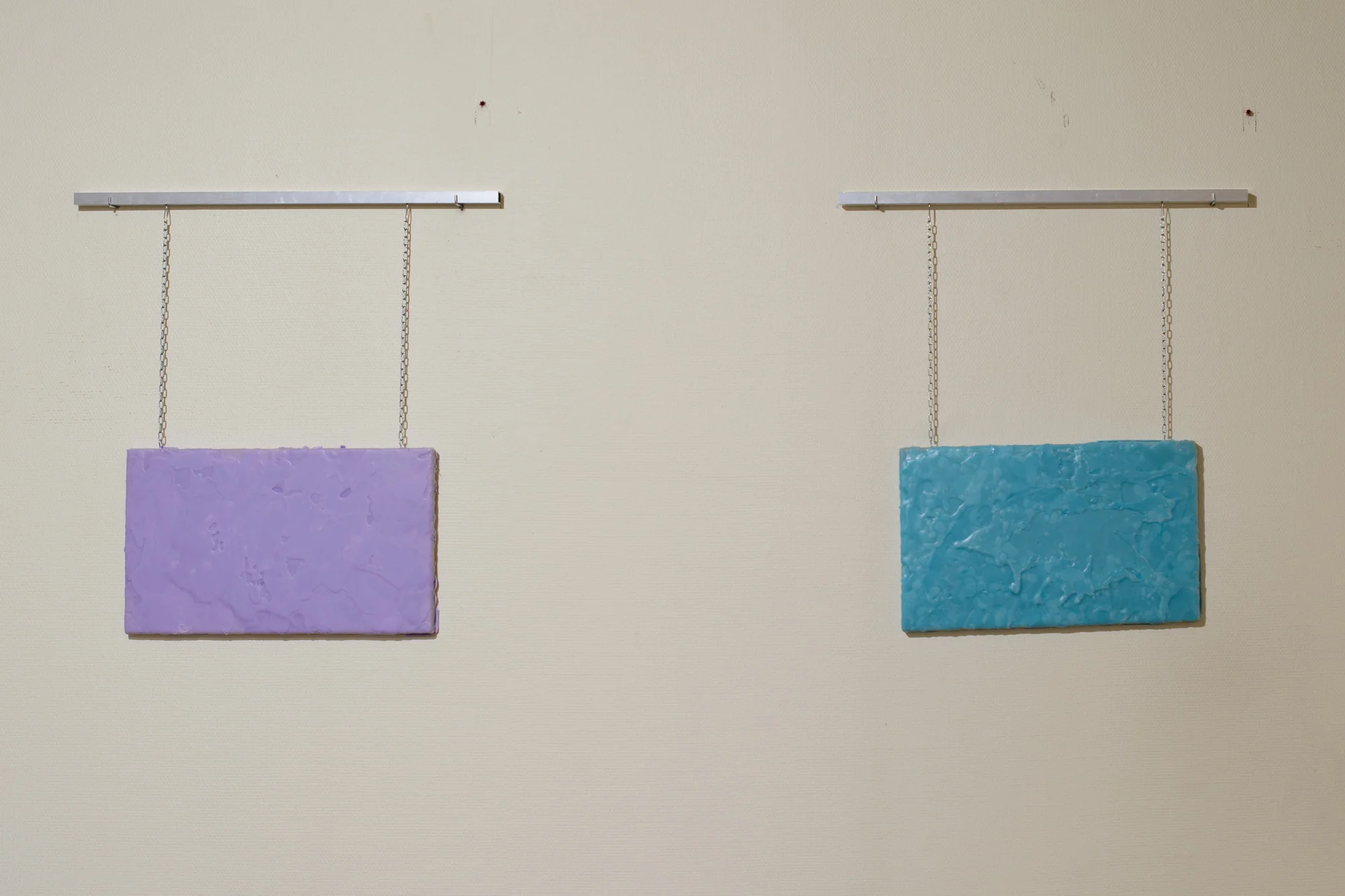   Od-light Purple  and  Od-light Od-light Turquoise   Aluminium, paraffin wax with pigment on canvas, chains  70cm x 70cm    