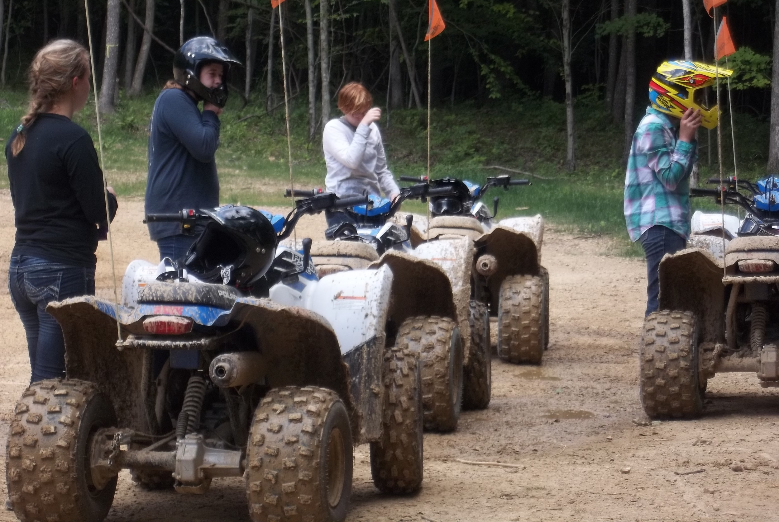 Scouts prepare to mount their ATV’s and do a circuit ride around camp.