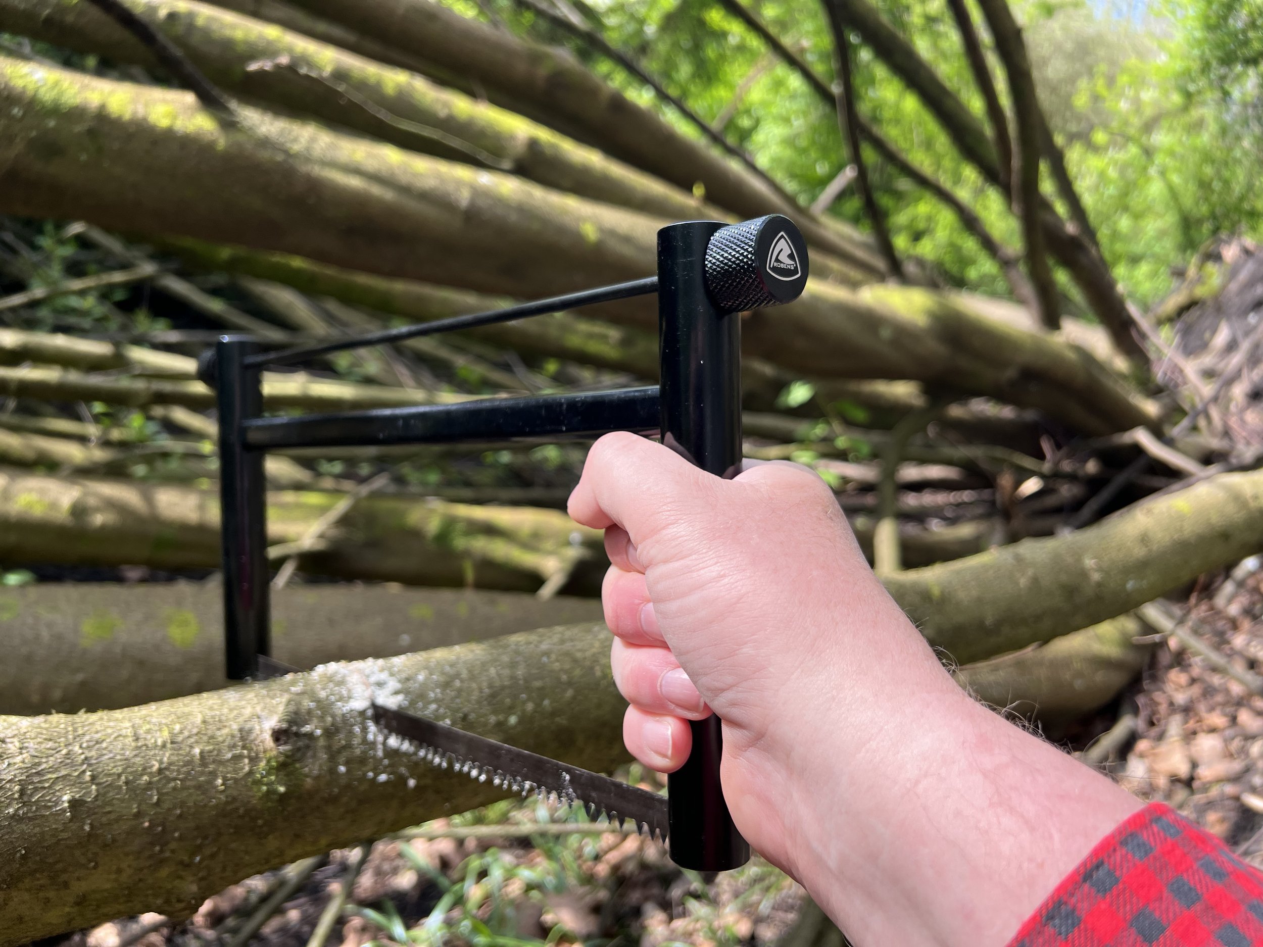 a Robens Cylinder Bush Saw cutting a branch