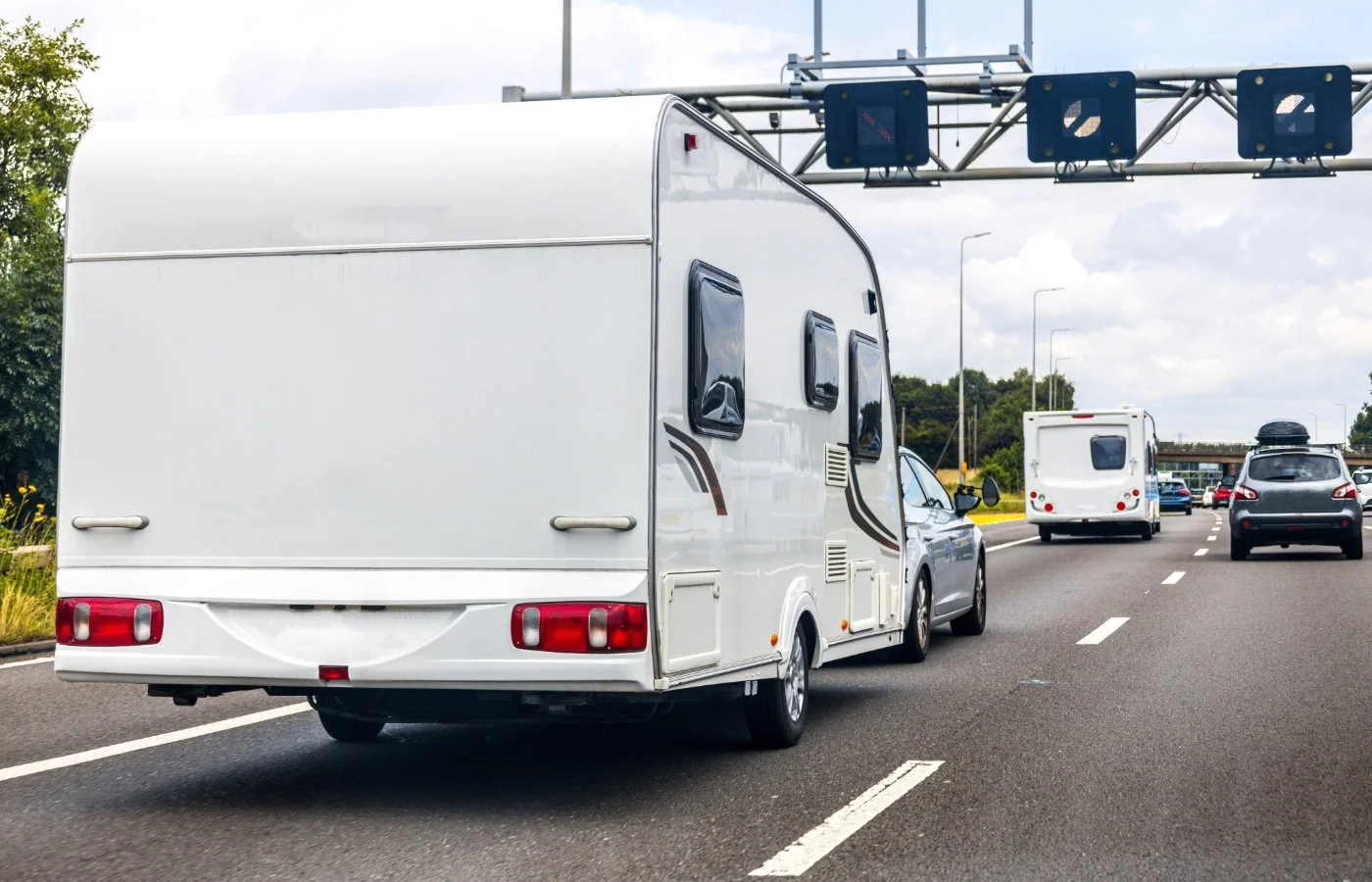 caravan being towed by a car