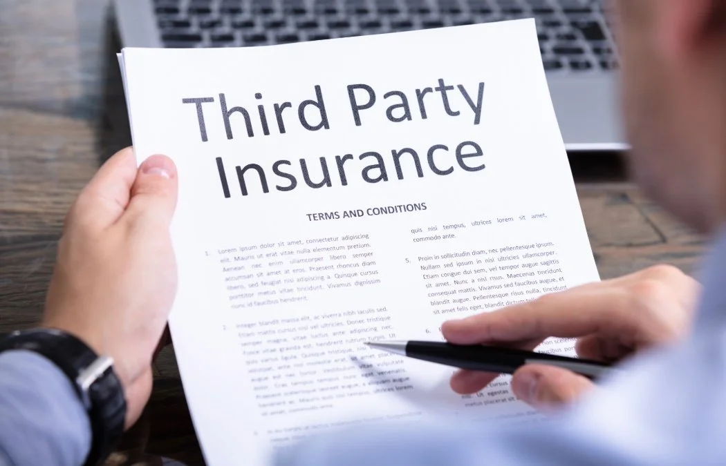 someone reading a third party insurance document