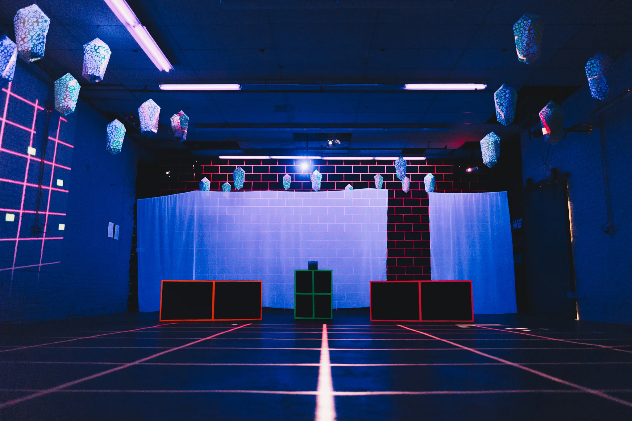 Installation view, WE BUILD WORLDS