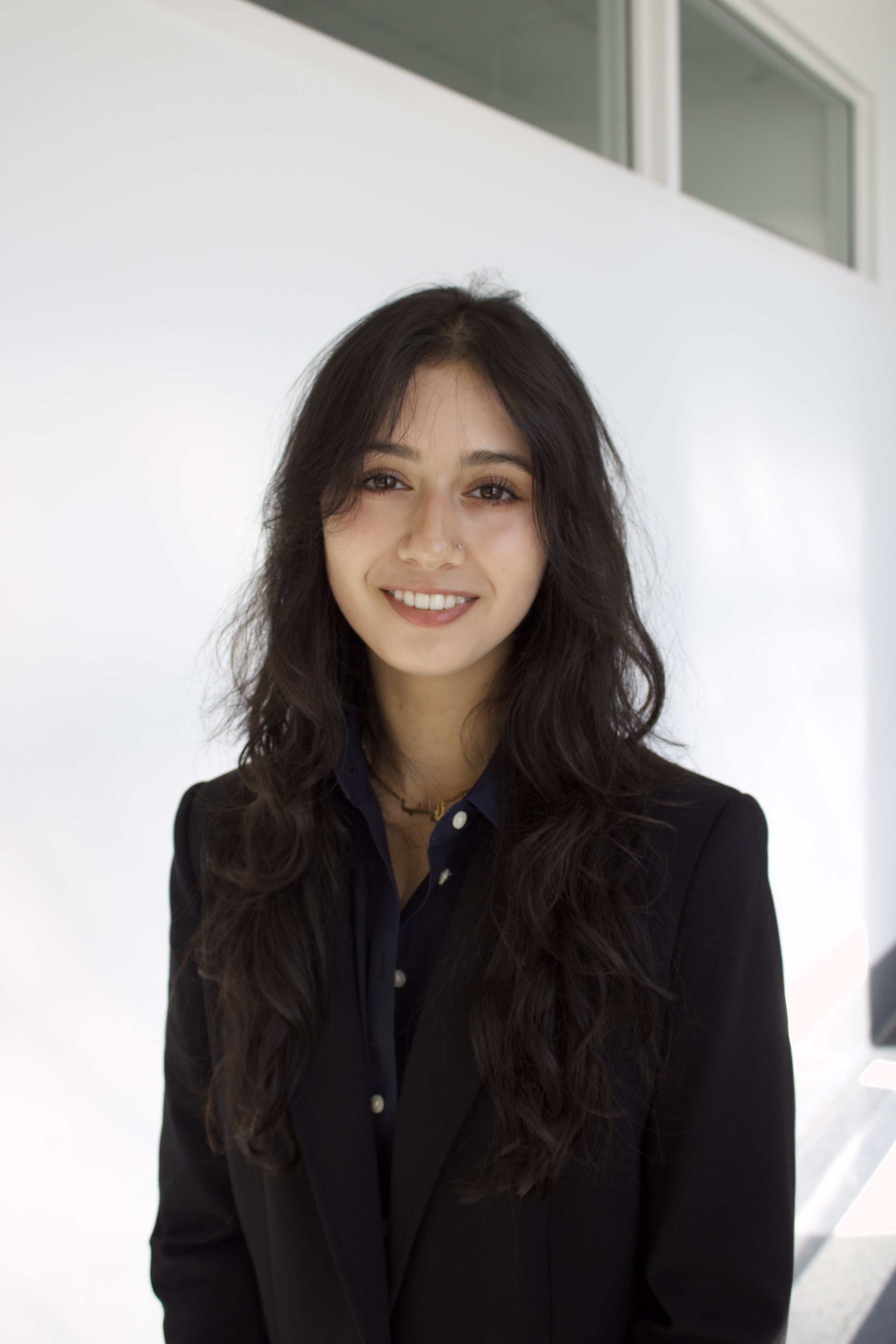 ZAINAB RAZA, ASSOCIATE