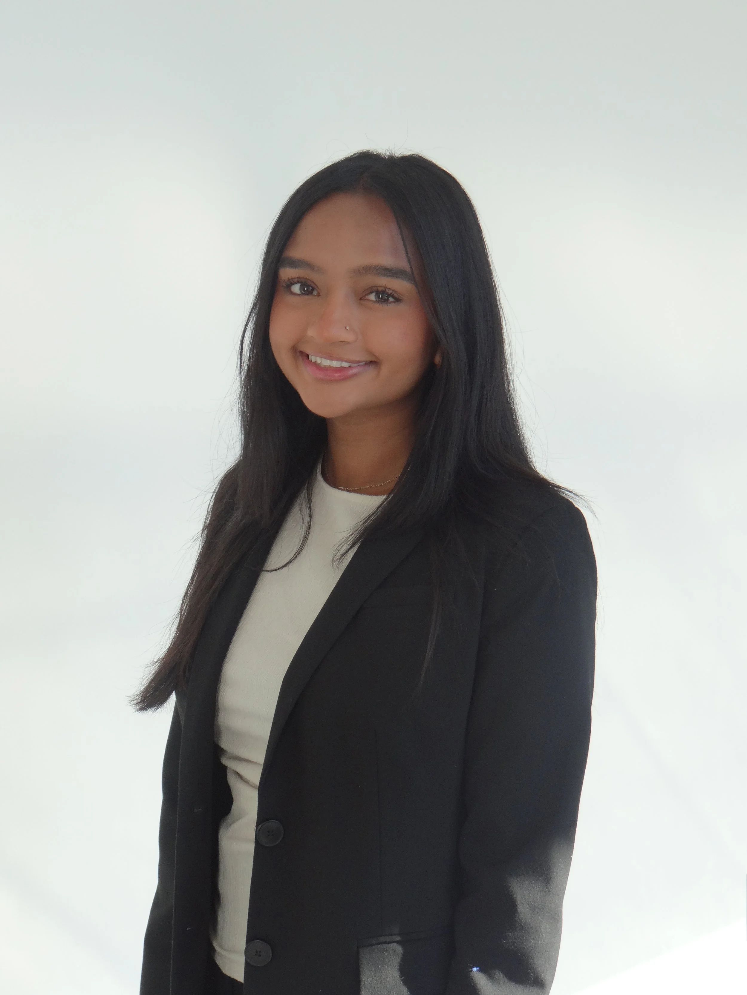 SARA SHAIK, DIRECTOR