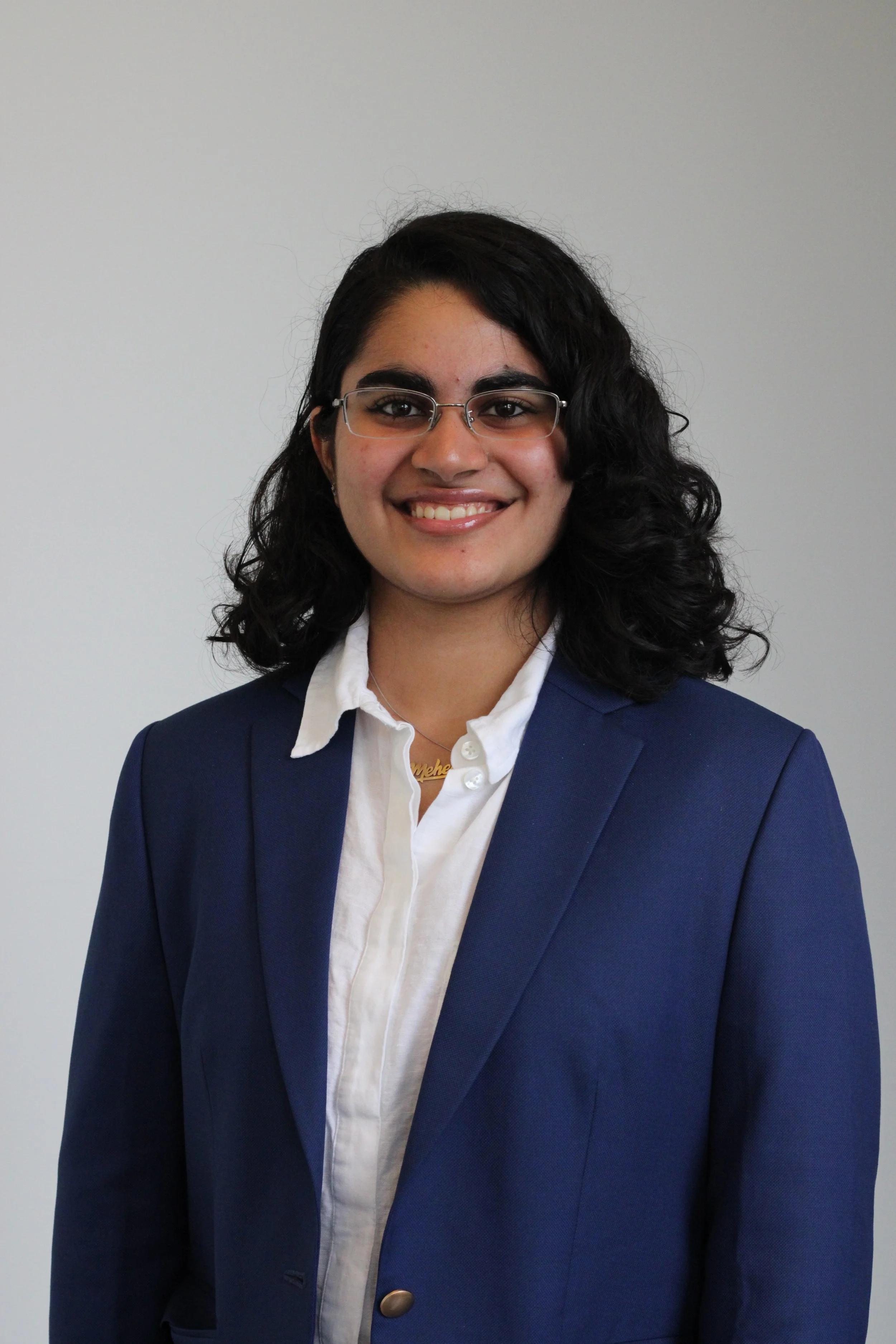 MEHER KHOKHA, ASSOCIATE