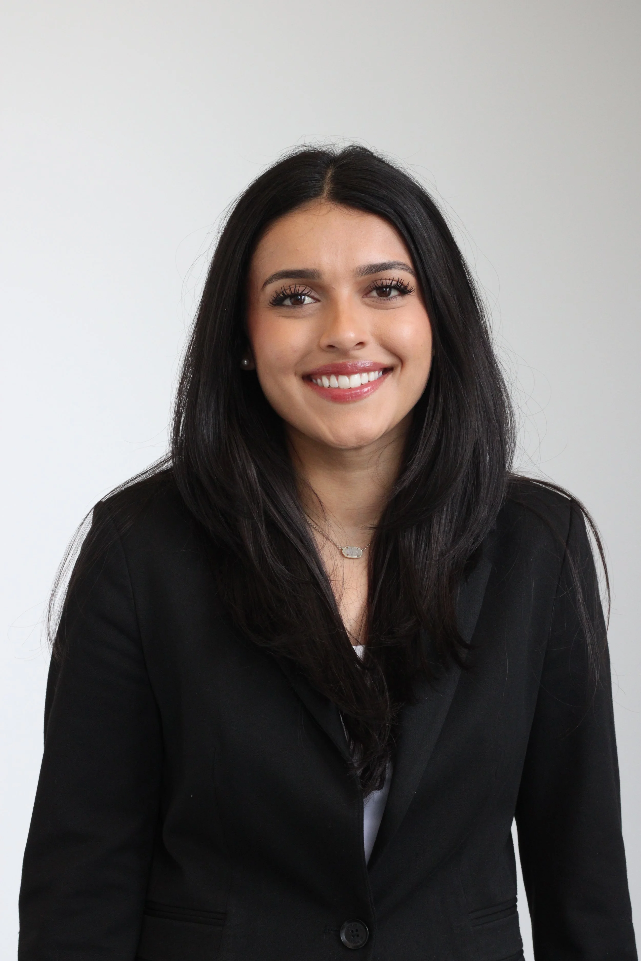 ZARA PASHA, ASSOCIATE