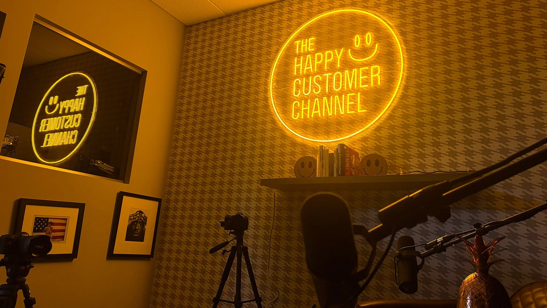 Podcast studio created for the Happy Customer Channel, featuring environmental branding, set design, lighting, and video production.