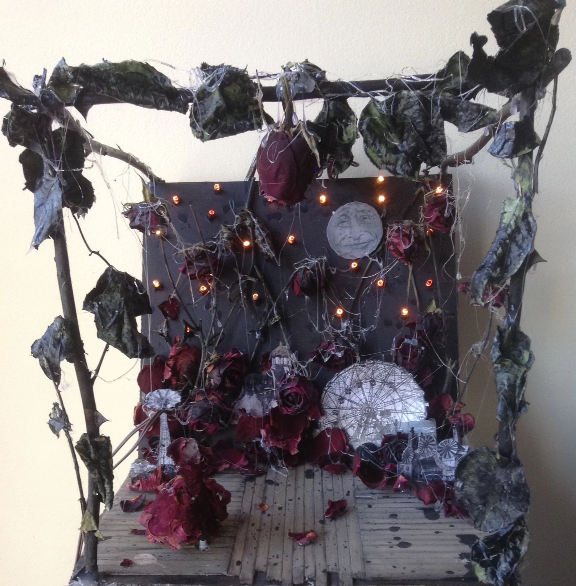 "Coney Island Baby" by Tom Waits, 1/8" = 1'0" scale model Materials: balsa wood, foam core, printer paper, acrylic paint, dried roses, hot glue, LED lights.
