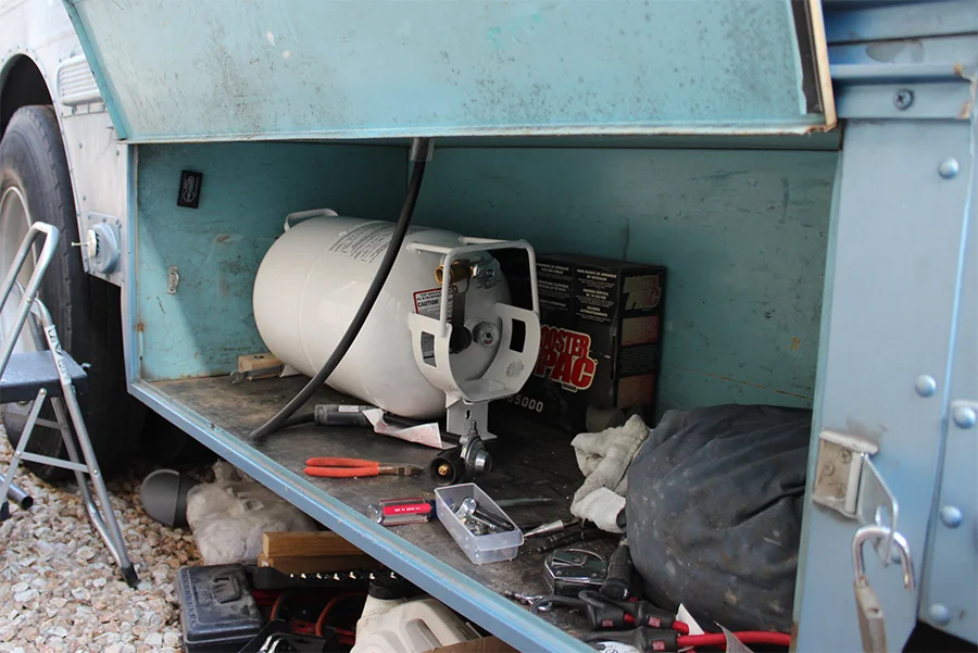 install-propane-stove-skoolie-interior-cooking.jpg