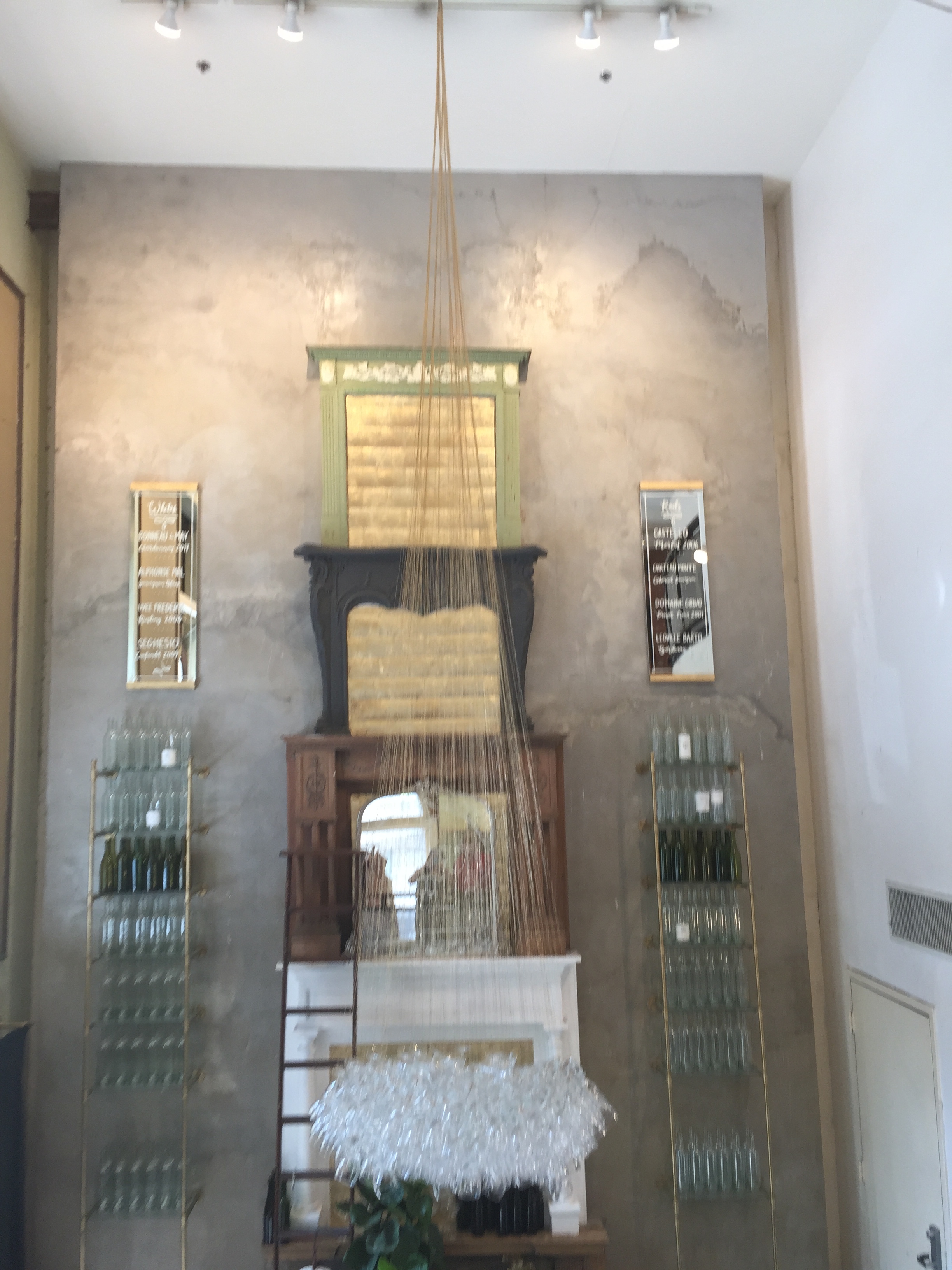 Anthropologie's wine glass chandelier shines in their flagship store in Philadelphia, PA. 