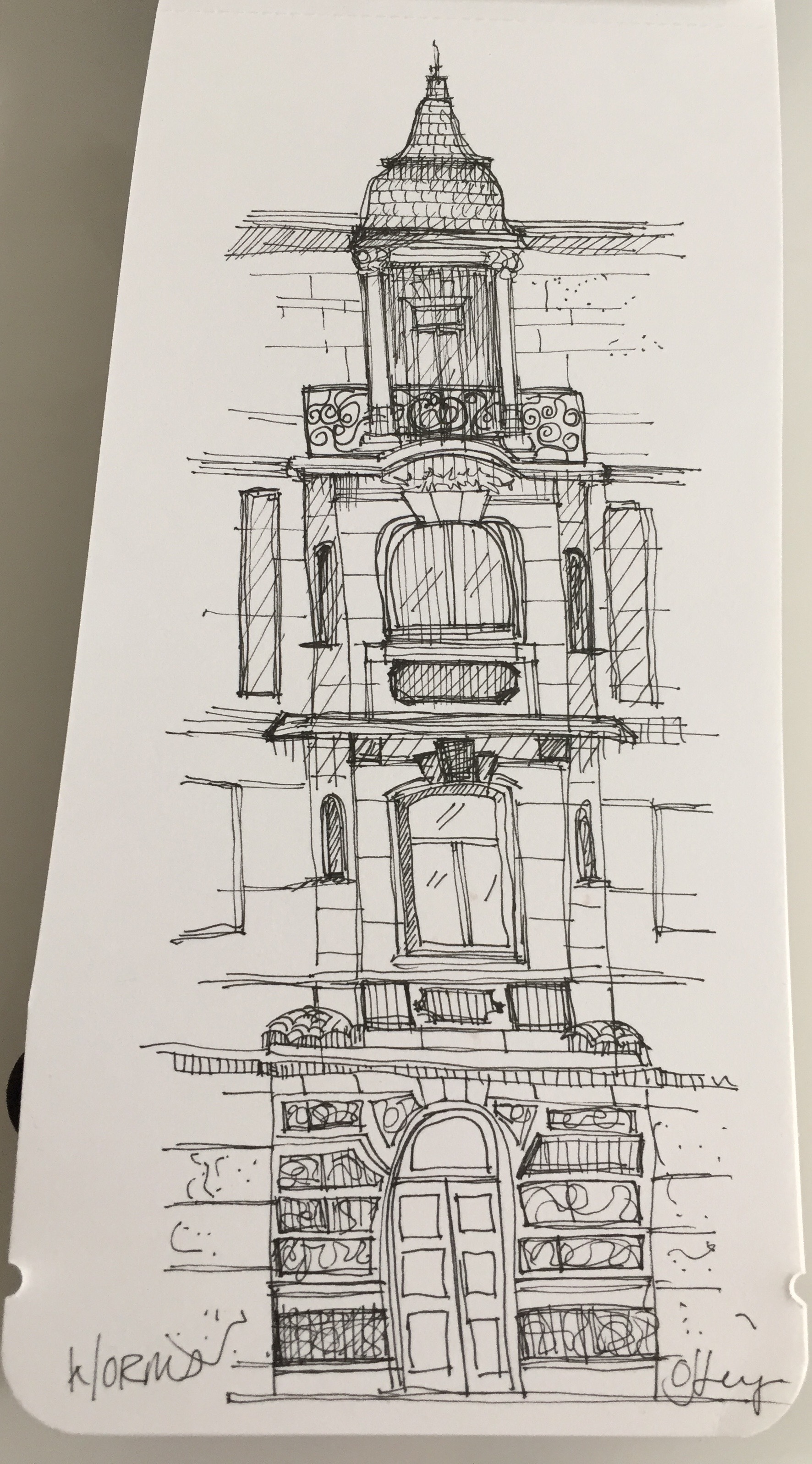 A whimsically stacked structure down the street.