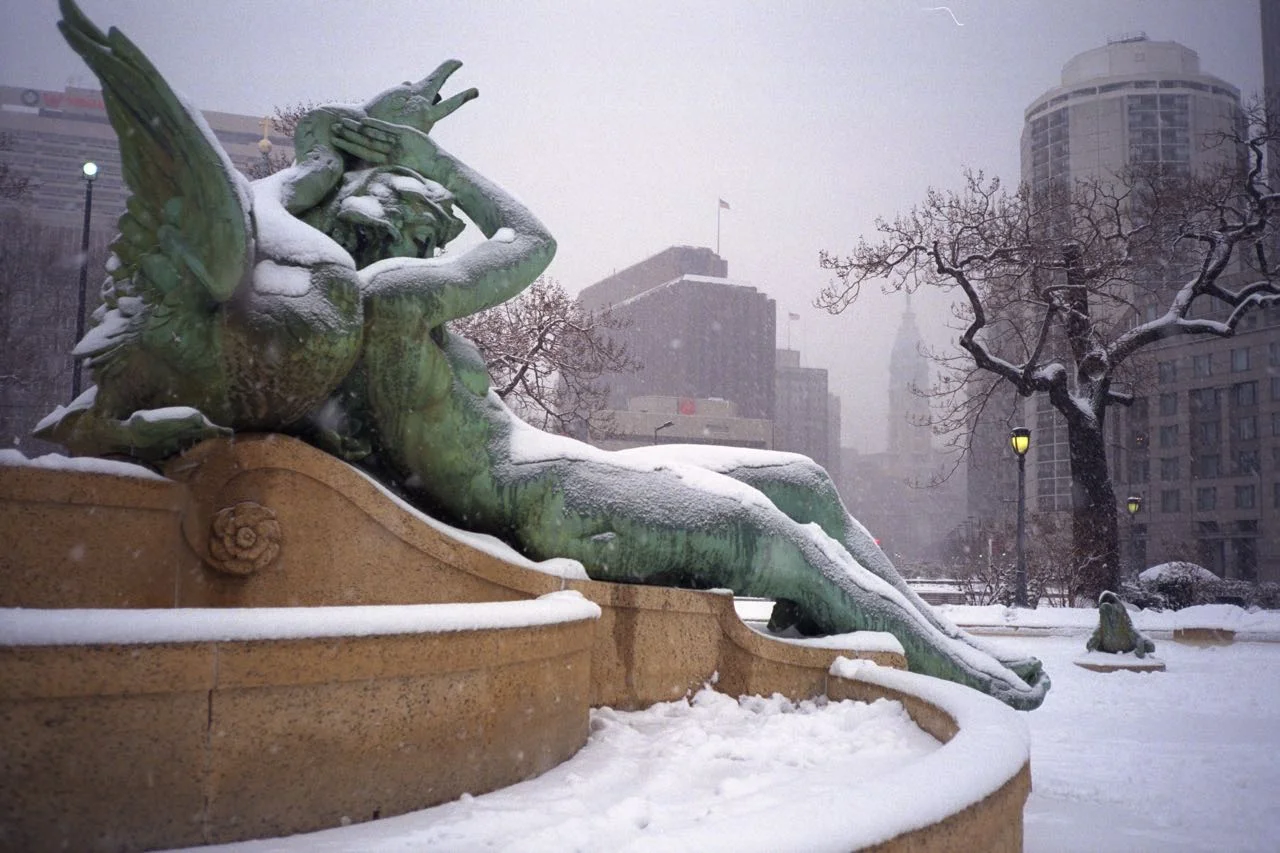 Snowy Statue at the Fountain