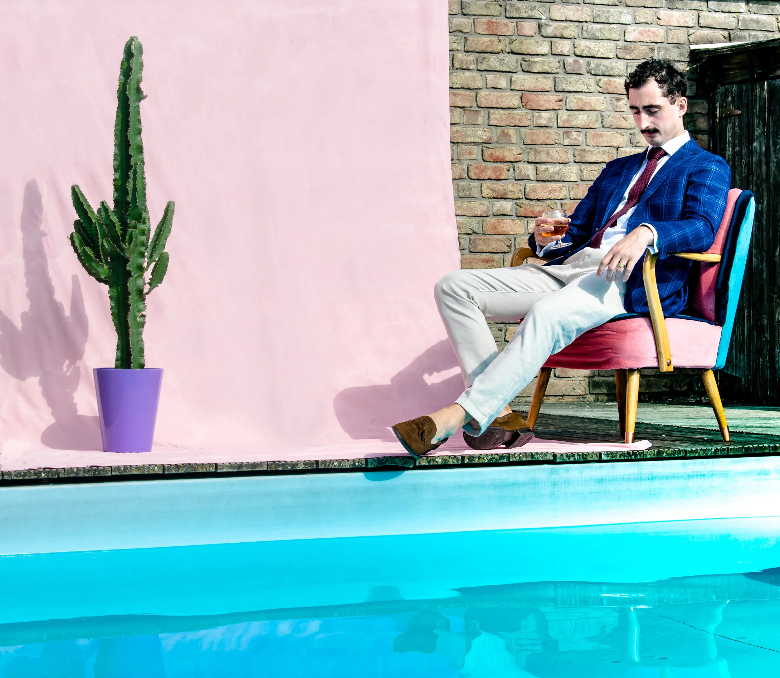 Playboy millionaire awaits his guest for his annual birthday party