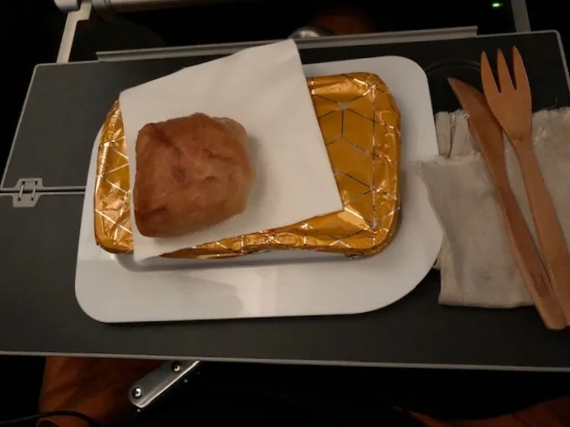 He just said no to the cutlery as this is what he was left with. Foil and 1x plastic container