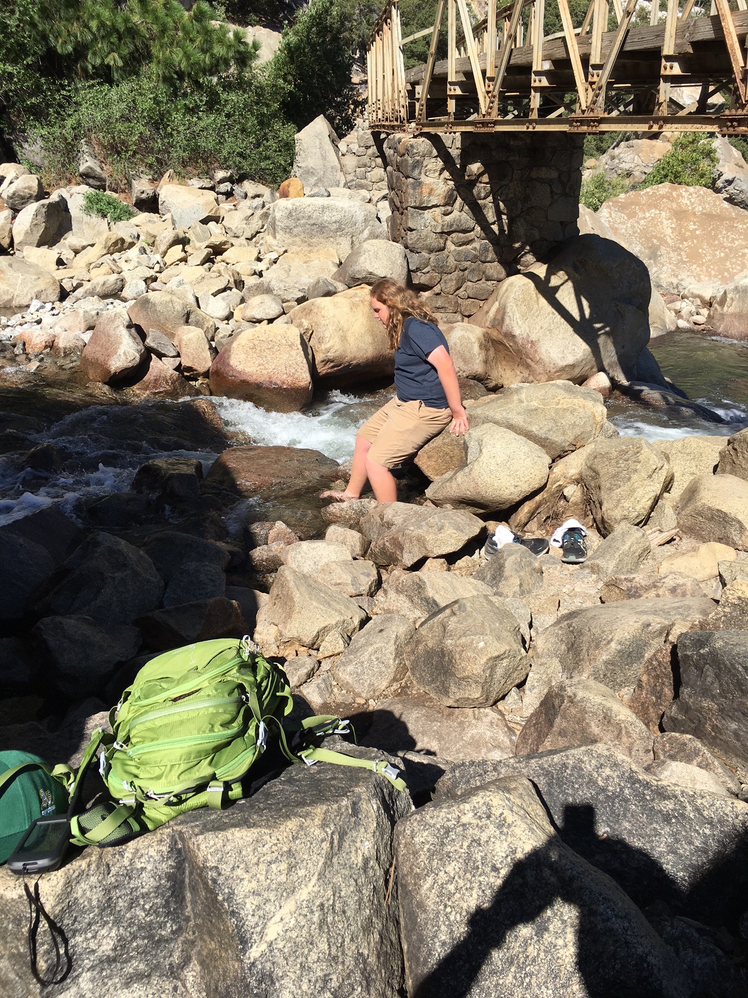 Adam gets his feet wet at the bottom of the falls