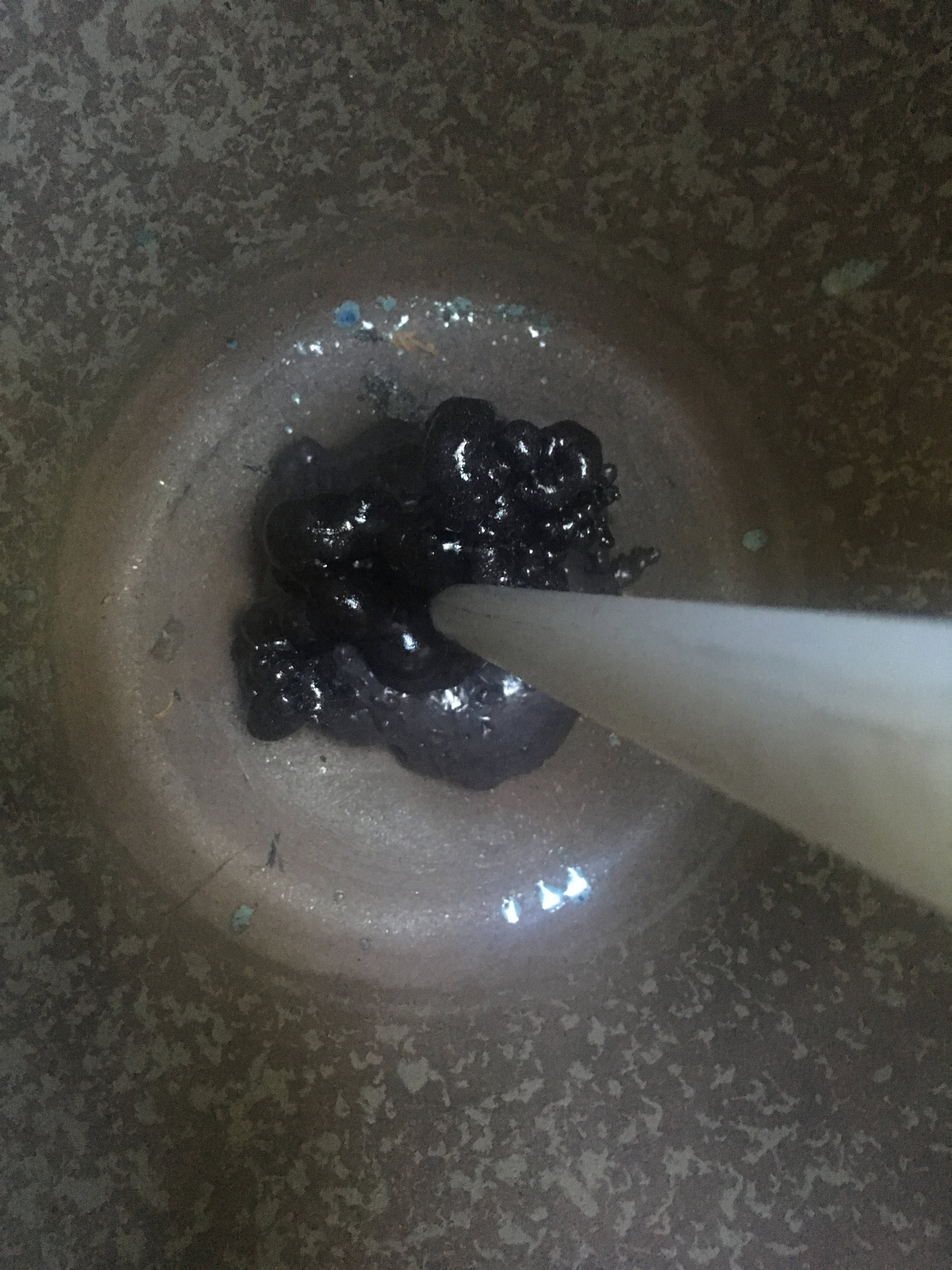 After 12 hours. Kind of hard to see, but it has expanded some and is hard now.