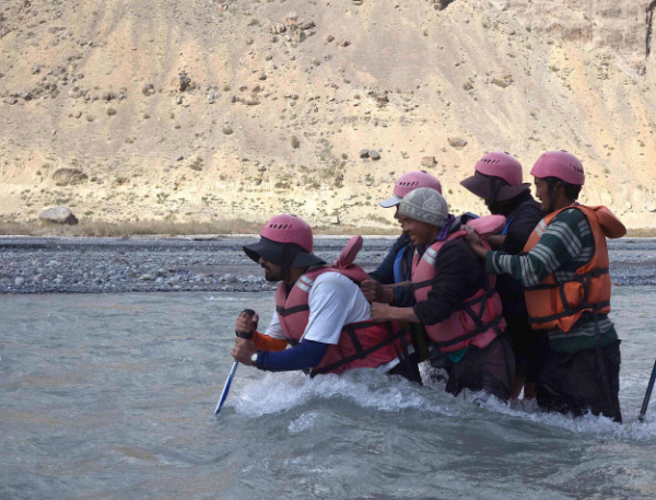 Outdoor skills training. NCF staff crossing the Spiti river, June 2015