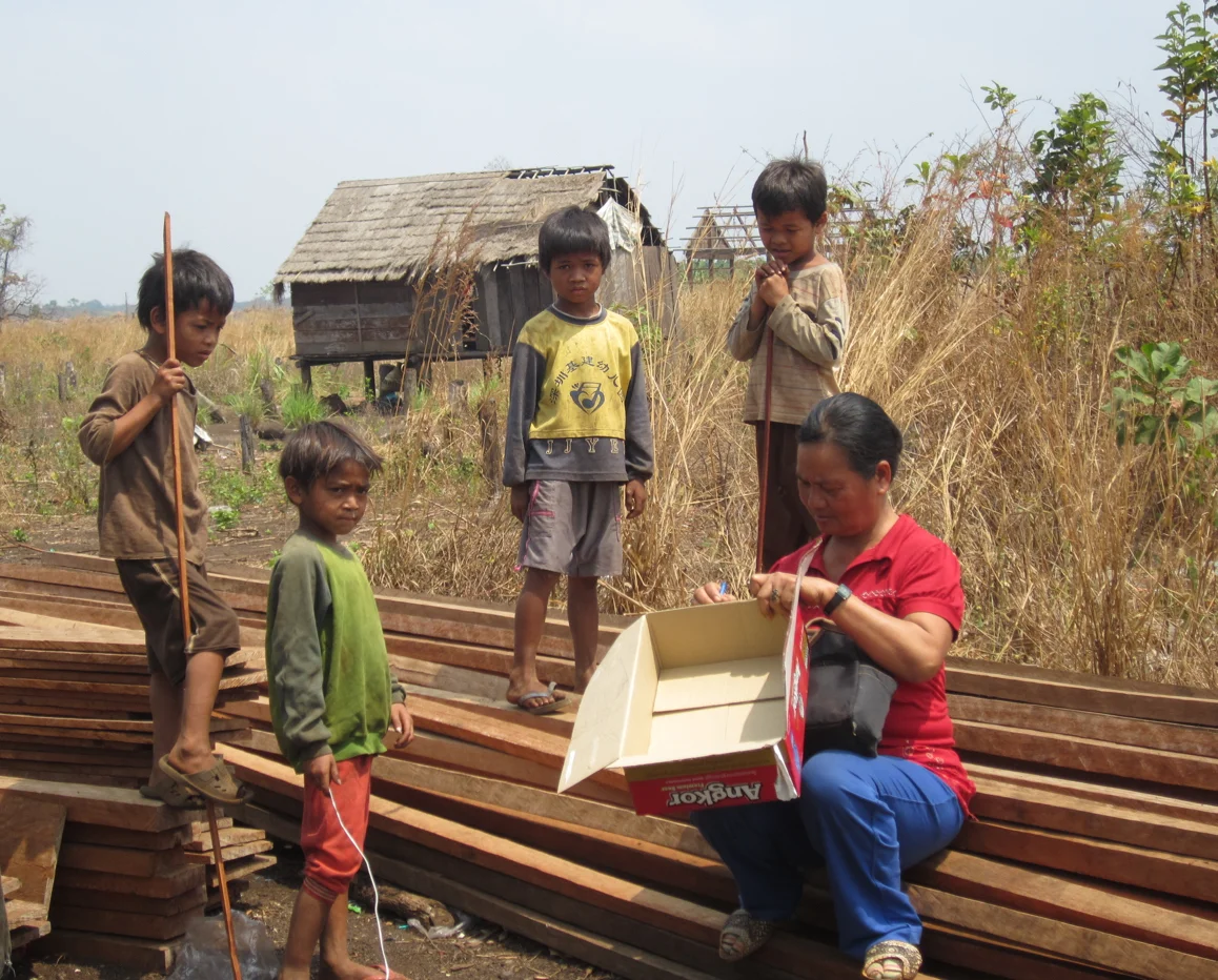 Indigenous Cambodians on the remains of a forest they were spiritually connected to. The human systems in which they're nested harvested the forest and their souls- just as it harvests blue-fin tuna. 