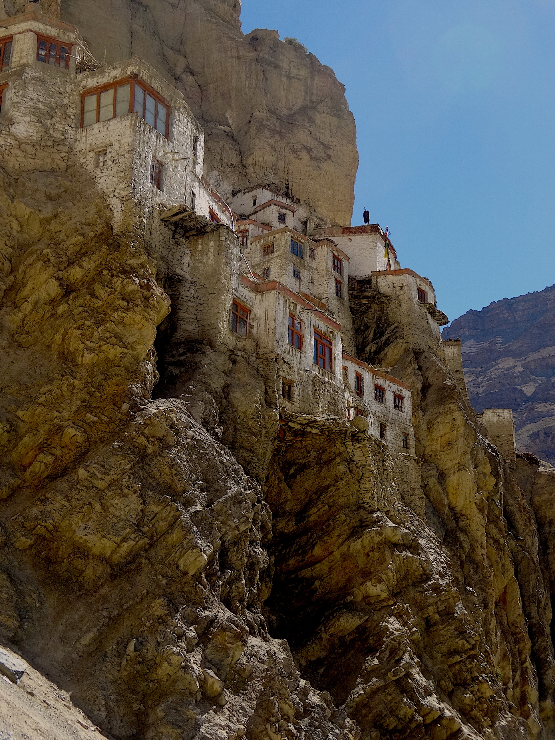 Phugtal Gompa perched eerie-like on a cliff- a reminder of old ways.