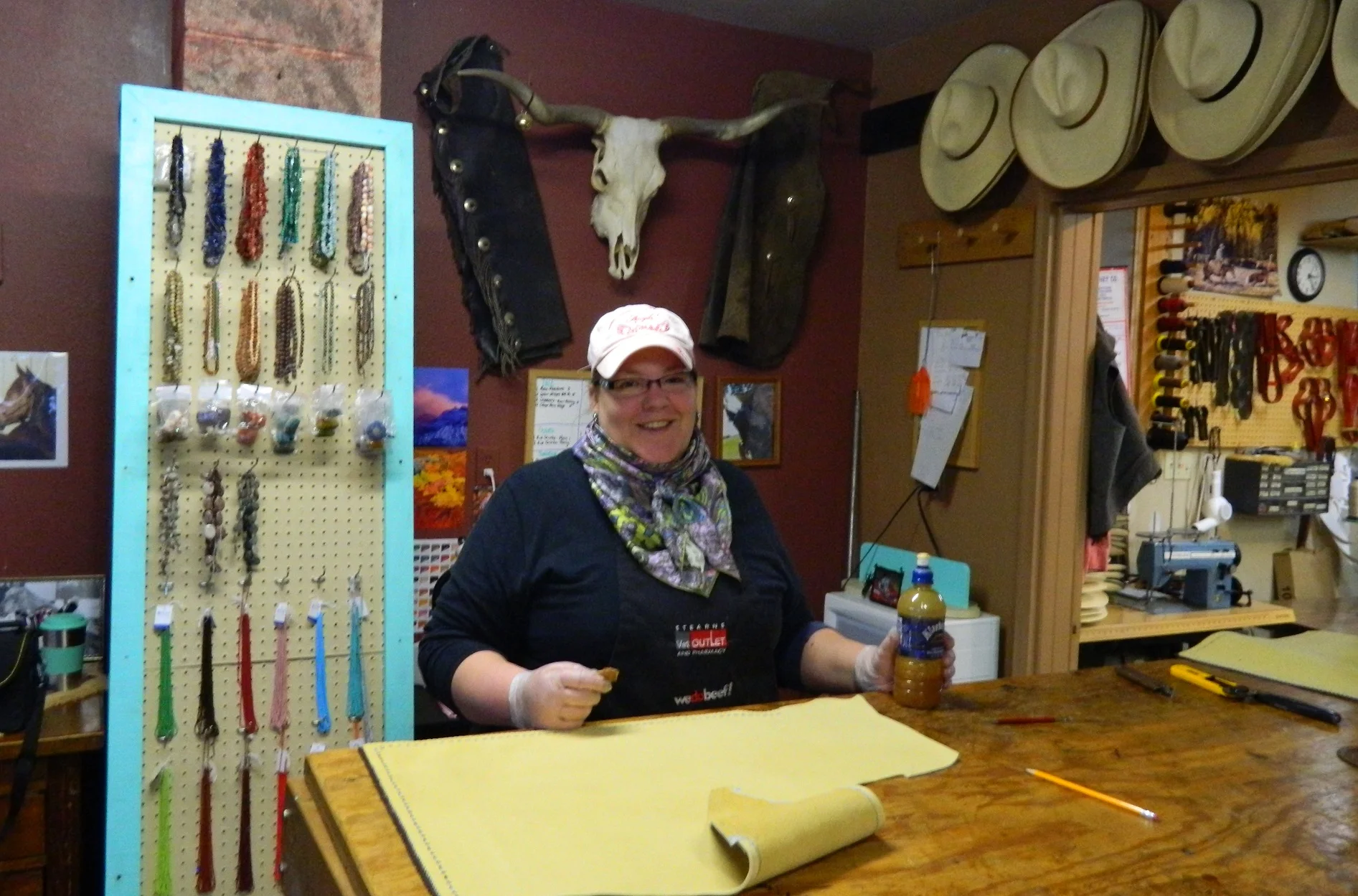 Jennifer making a pair of custom chinks.