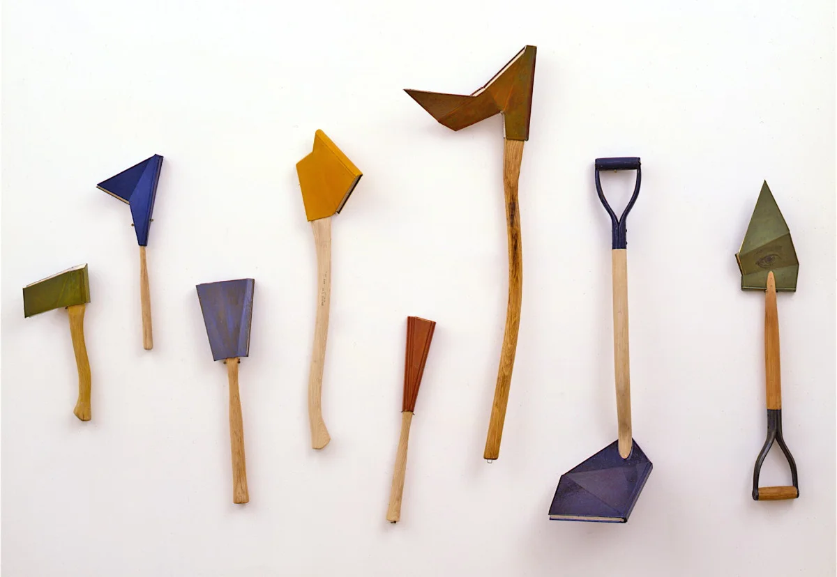 Implements of knowledge, 1992: wooden tool handles, books, oil paint; dimensions variable (the largest one is about five feet long).
