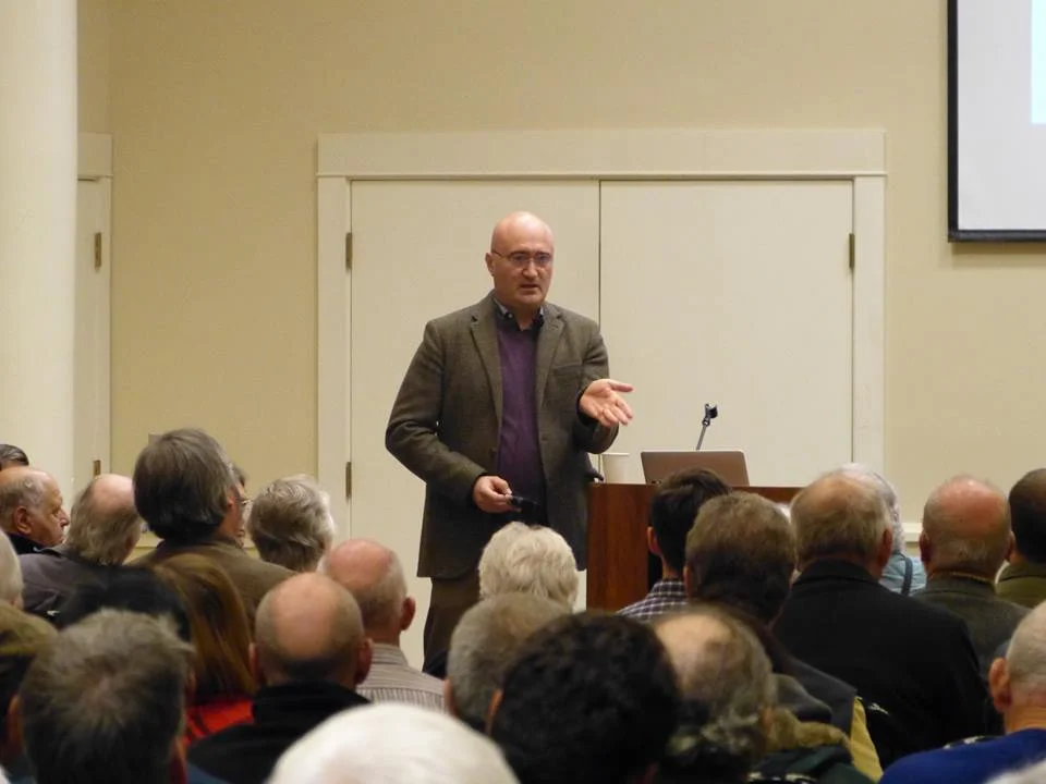 Jarret Walker lecturing on public transportation as an instrument of freedom at November 2016 event in Eugene, OR.