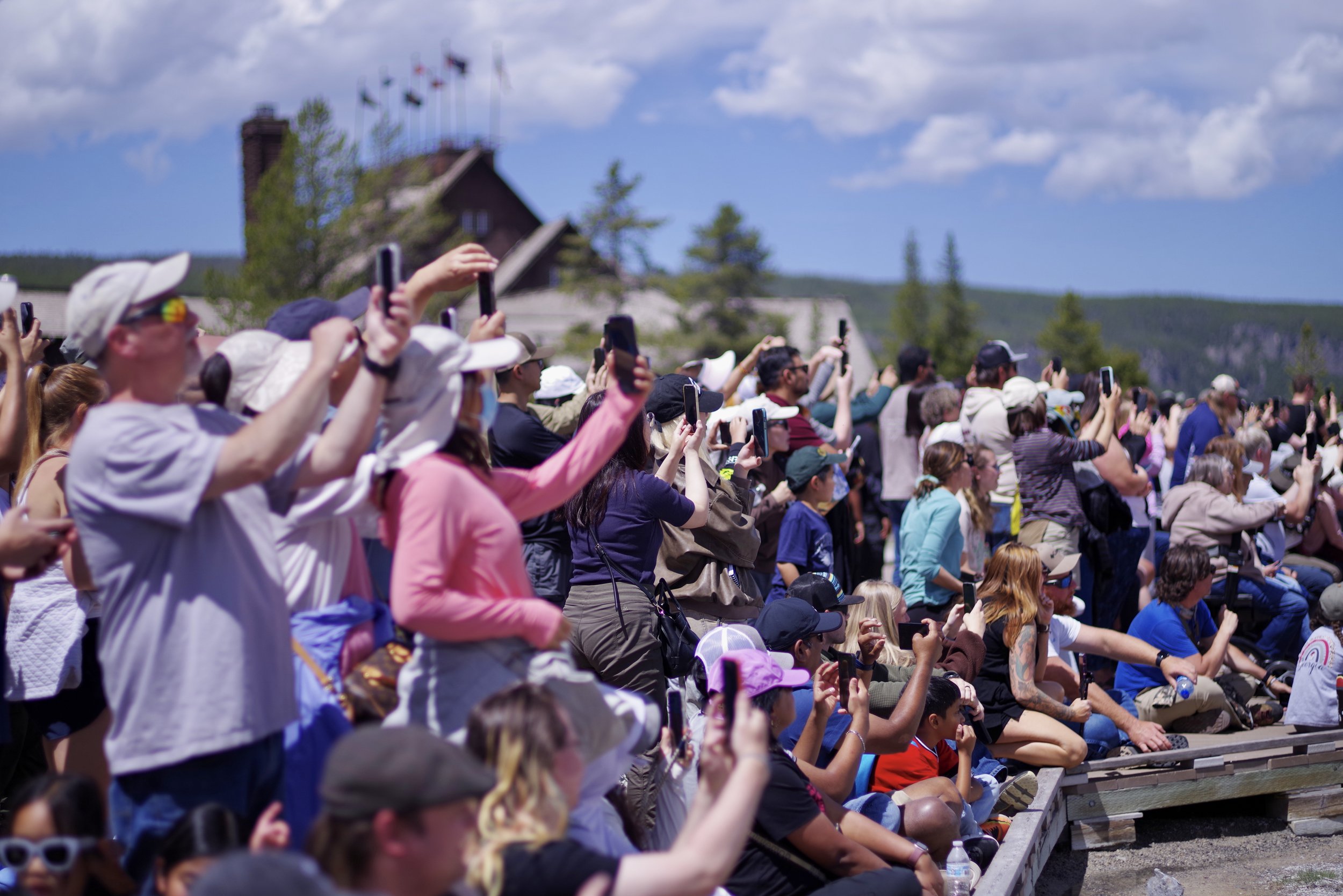 The people watching Old Faithful. Hahaha.