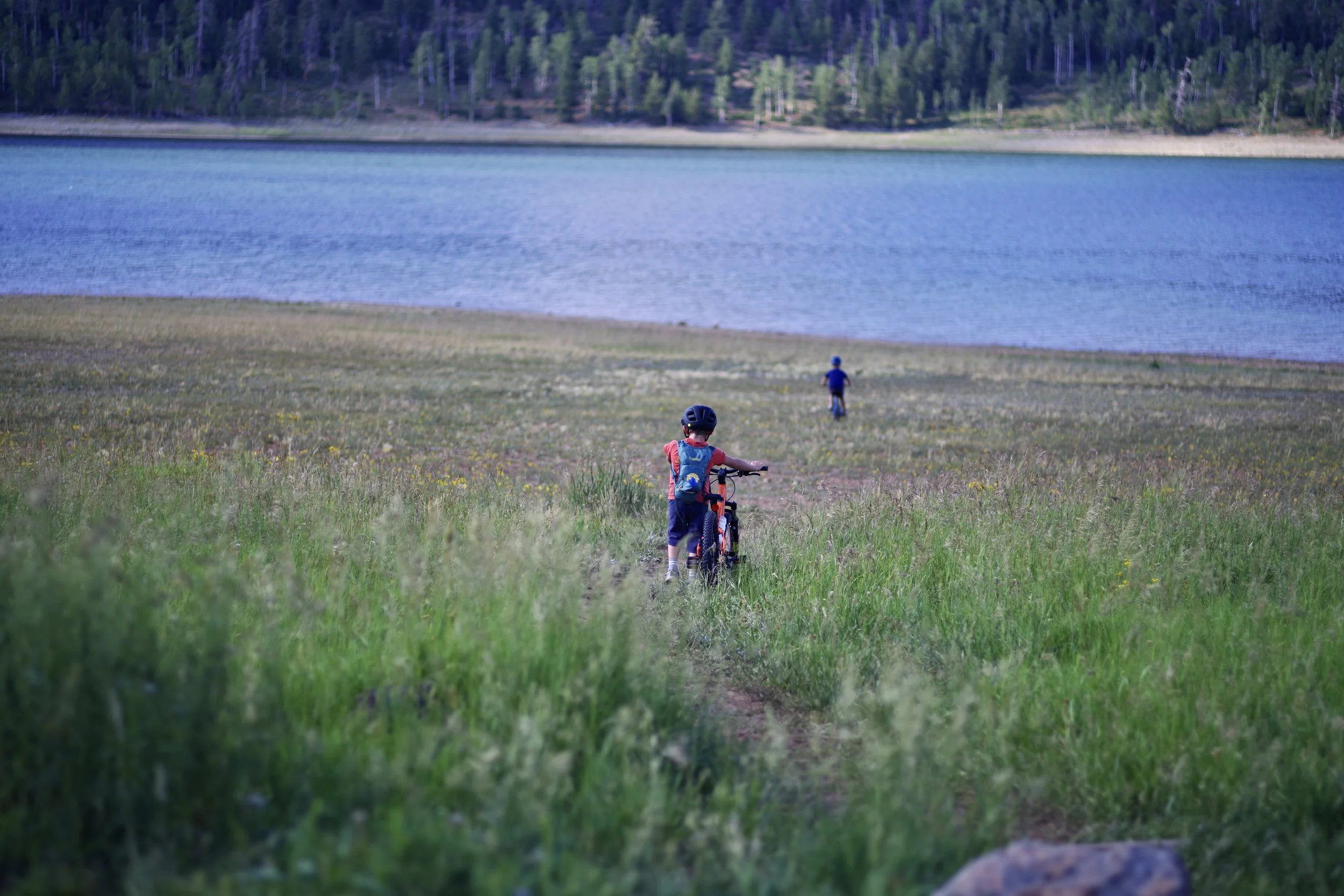Miles biking to the lake.