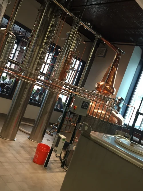 Once the raw materials travel through the tanks to the copper, booze comes out in the tubes.