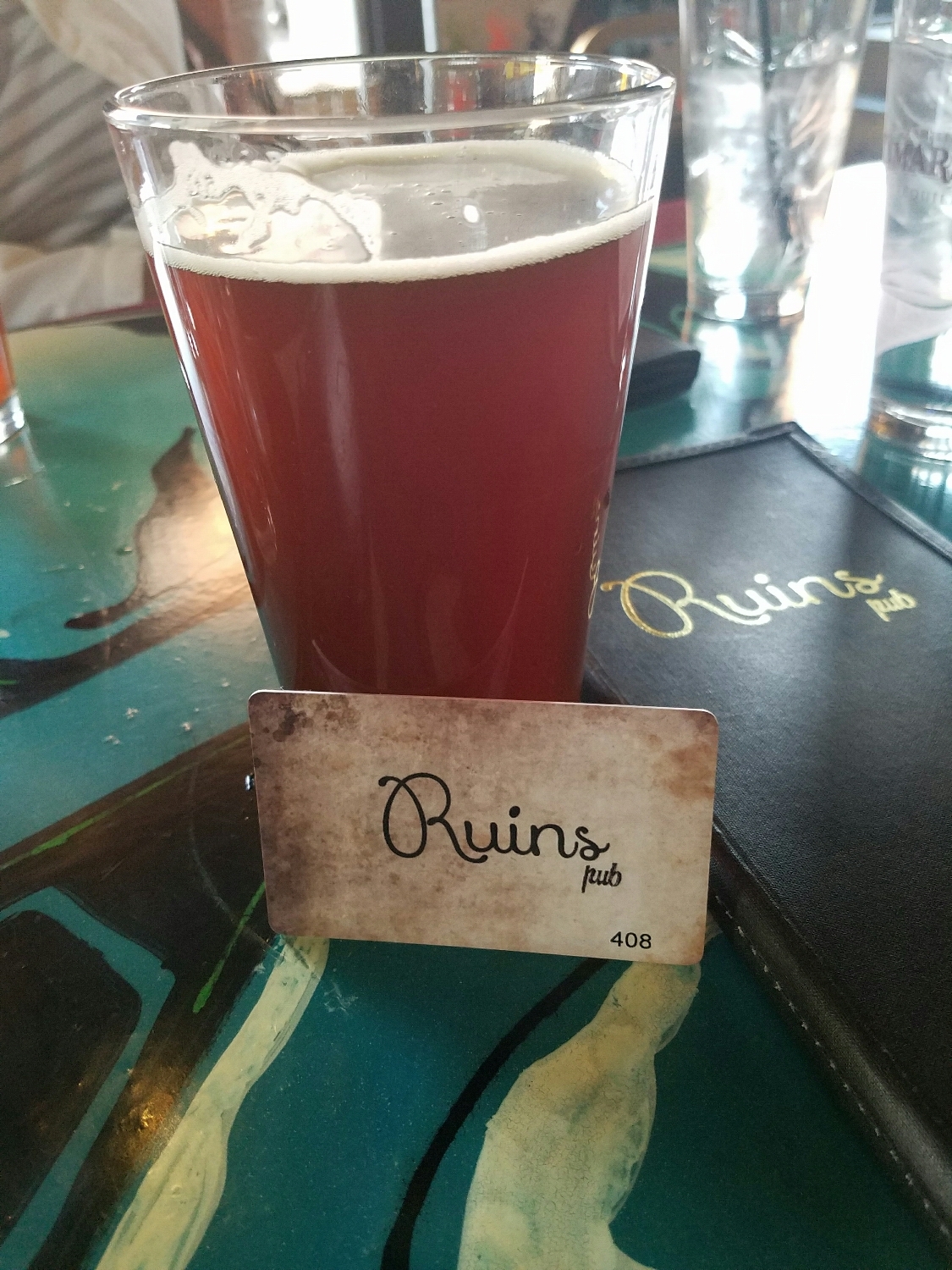 Ruins Pub tap card and delicious beer!