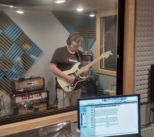 Guitar Student James Murphy of Greyslake IL soloing away during his guitar lesson.