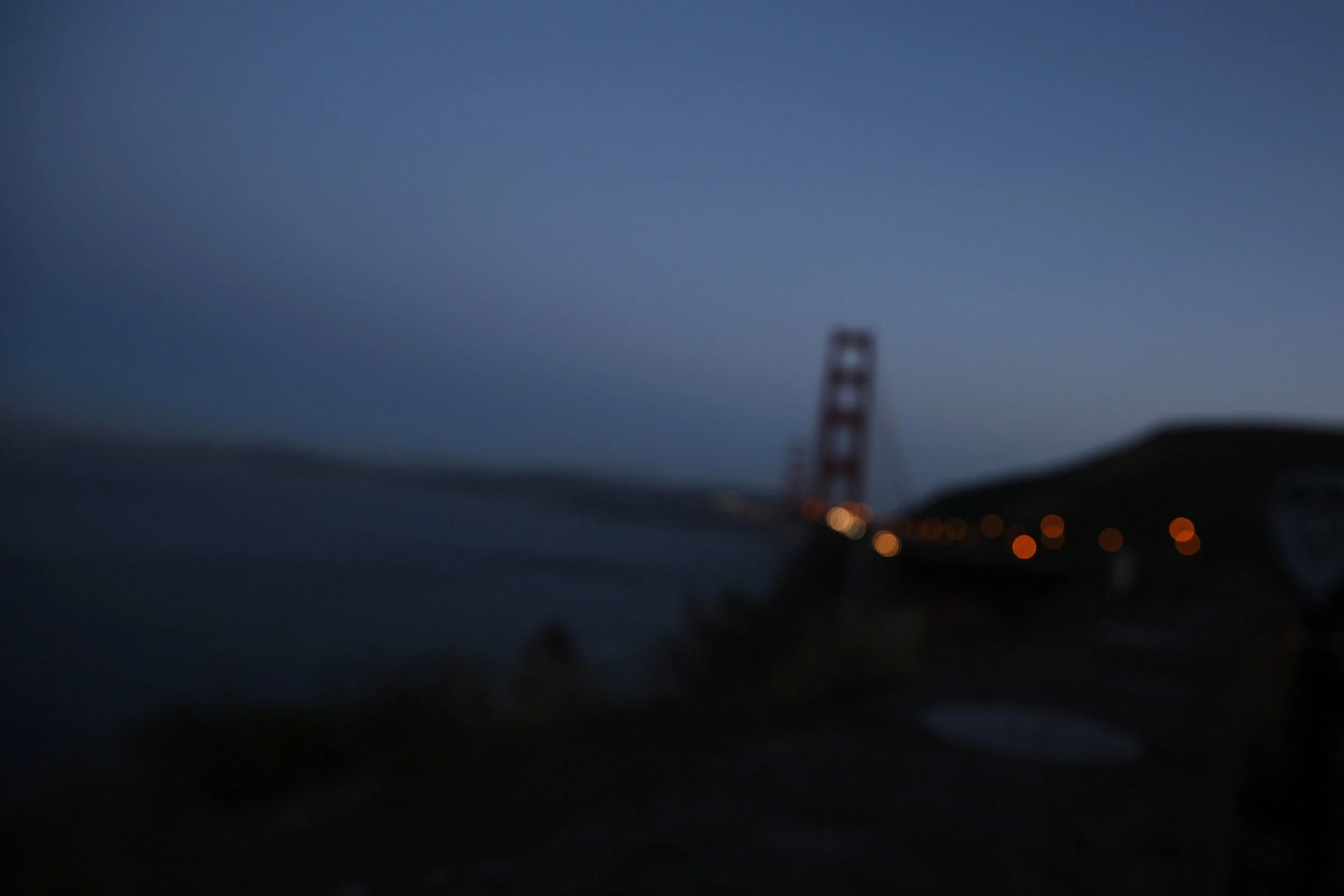 The Golden Gate Bridge is seen at dusk in San Francisco. While tourists stroll up and down it every day, on average someone jumps to their death every 13 days. Unlike other iconic structures, this bridge does not have a suicide barrier. After the Gamboa family lost their son to suicide, they resolved to do everything they could to campaign for a suicide barrier.
