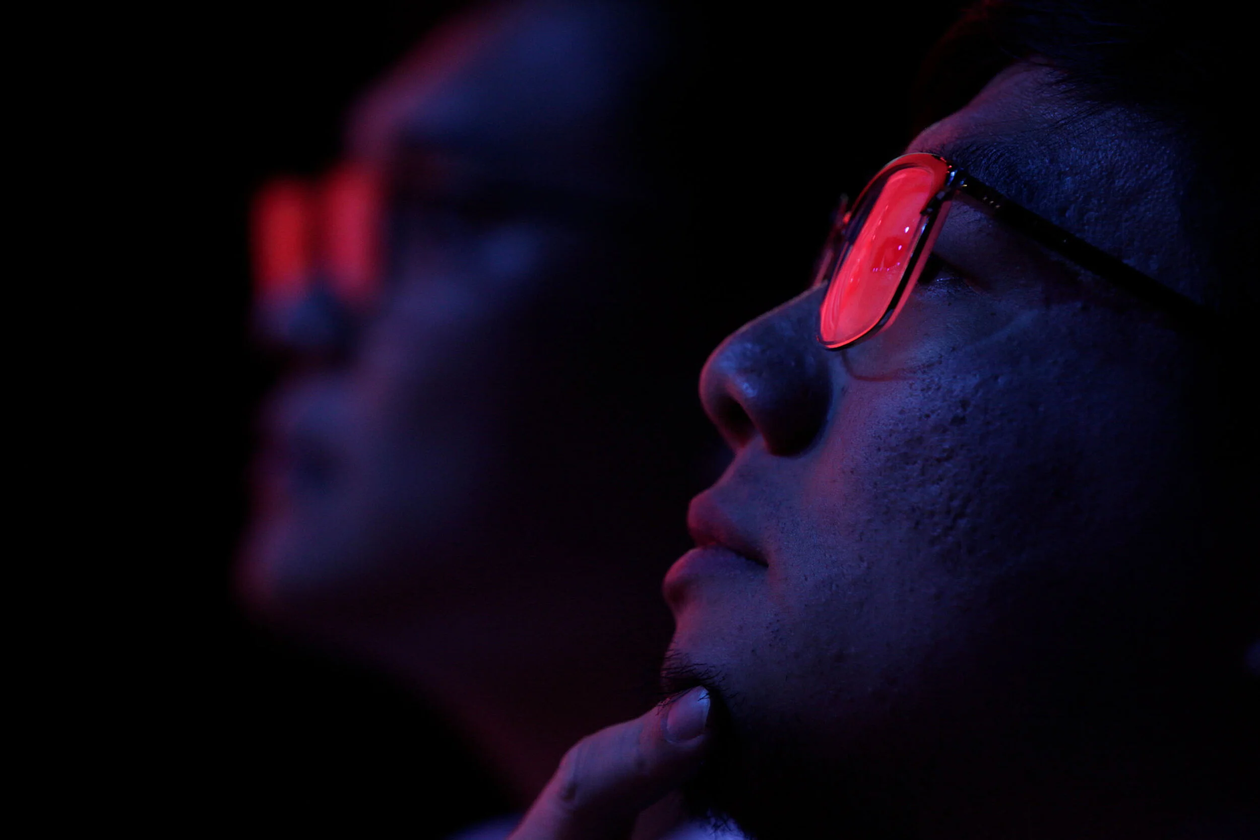  Han Boz, left, and Due Qiu, right, workers with the Hangzhou Spark, watch the Dallas Fuel play the Hangzhou Spark in a professional gaming match in Burbank, Calif. The Hangzhou Spark won 3-1. 