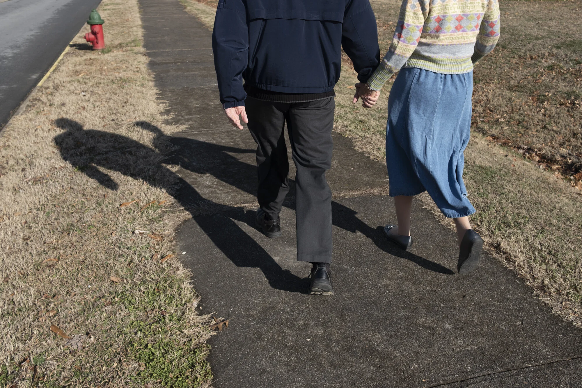  Dr. Moughon and his wife, Mary, walk to a church that meets in the neighborhood elementary school while the roof of their church building gets repaired after storm damages. They met at Vanderbilt University in Nashville while he was in medical schoo