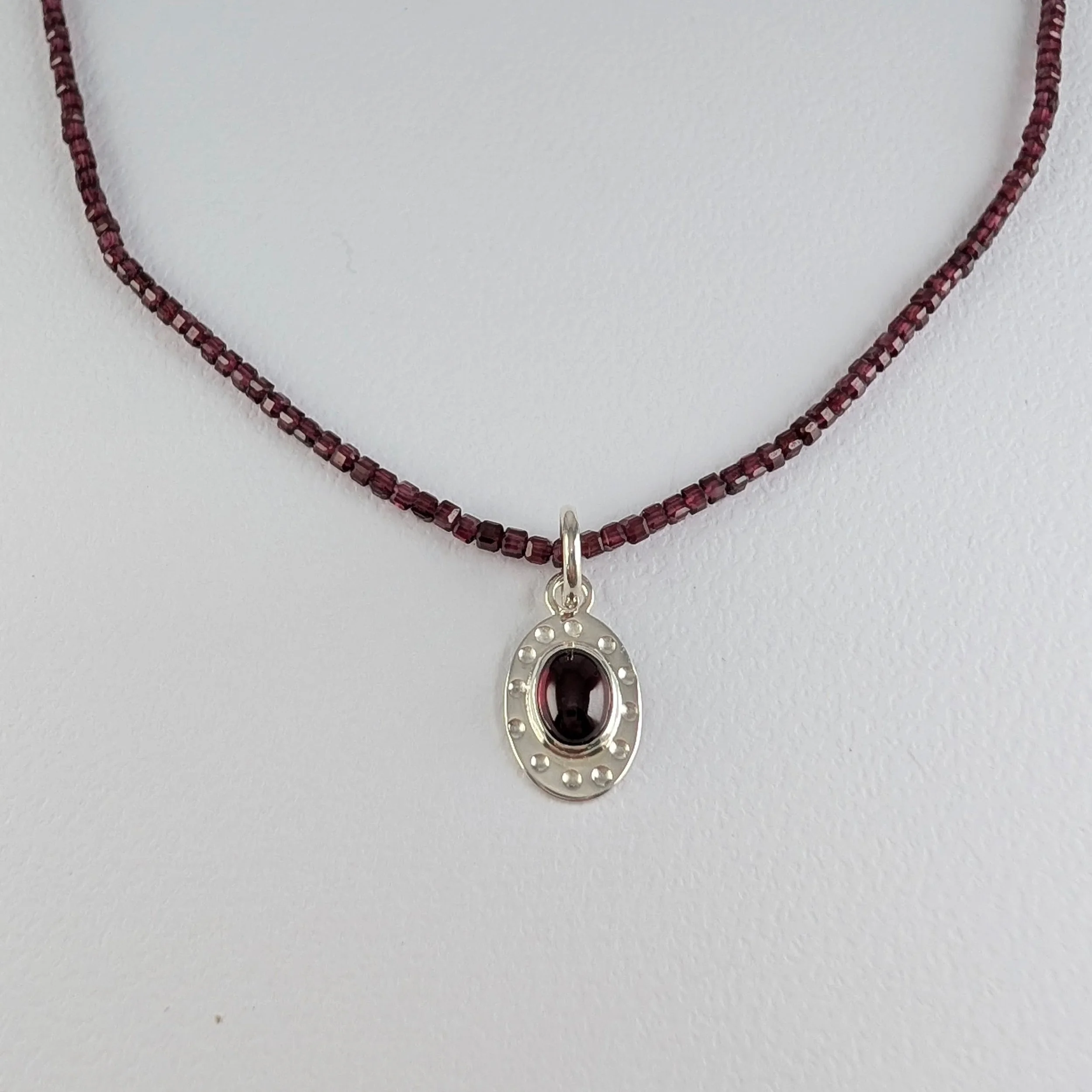 Knotted Garnet Tiny Cubes Necklace on Silk v2.jpg