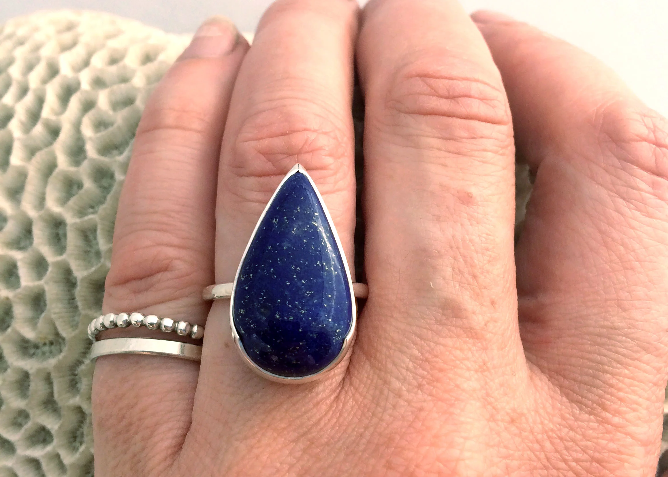 Lapis lazuli ring on hand.jpg