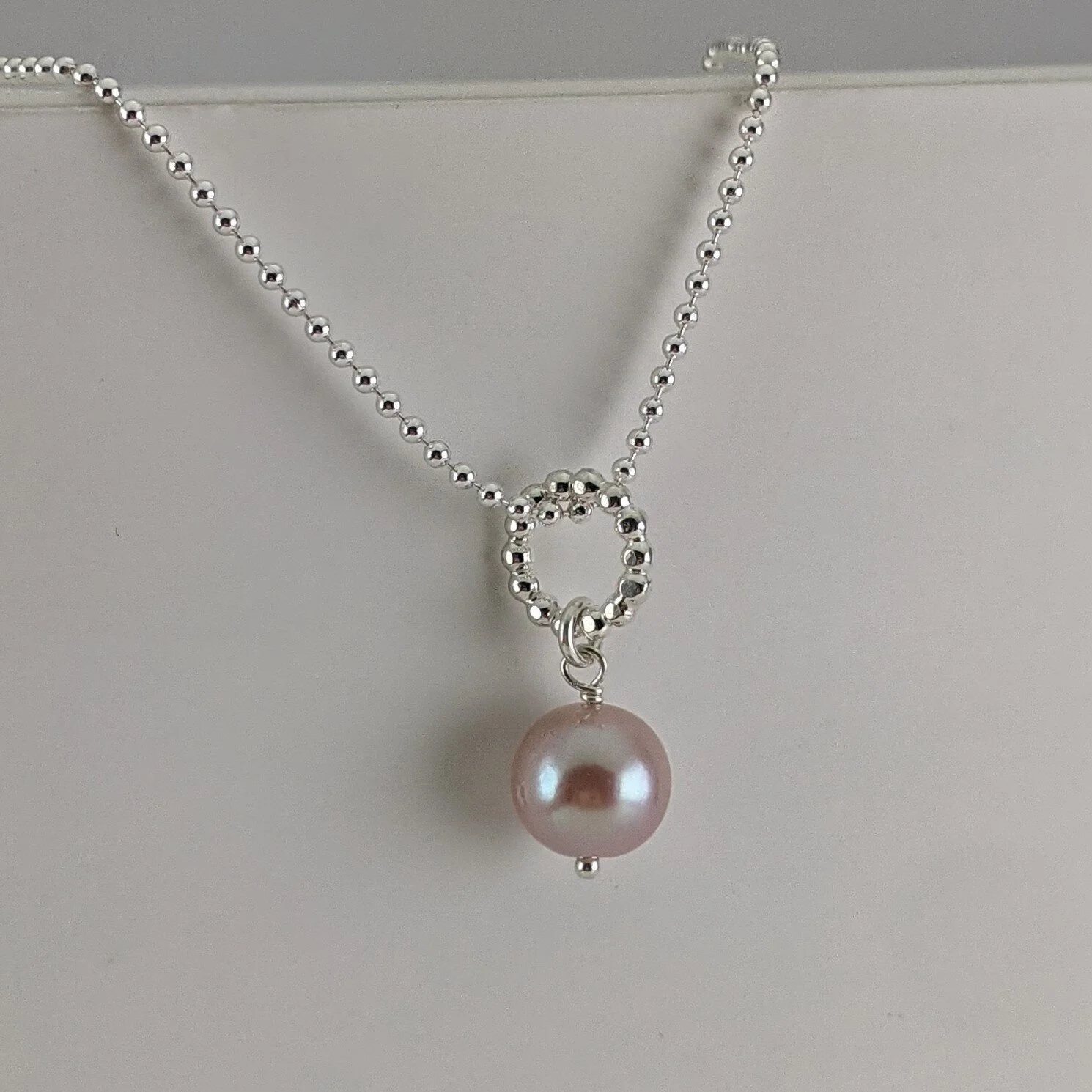 Pink edison pearl pendant with beaded wire bail